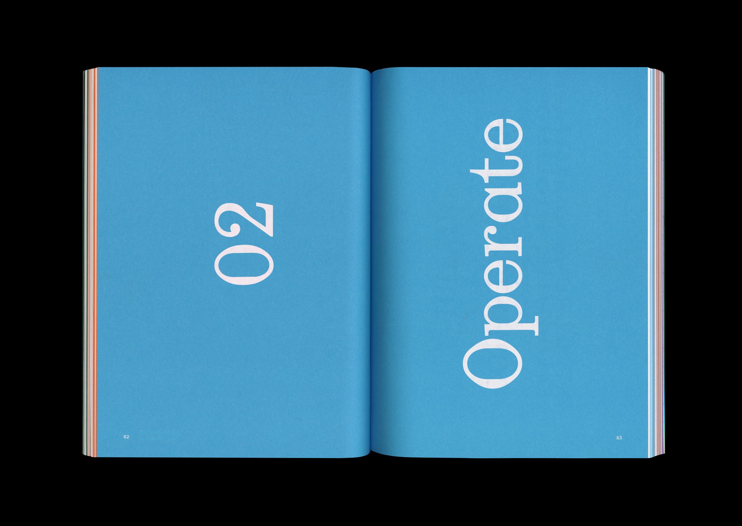 Open book with blue pages displaying the text '02 Operation' across both pages.