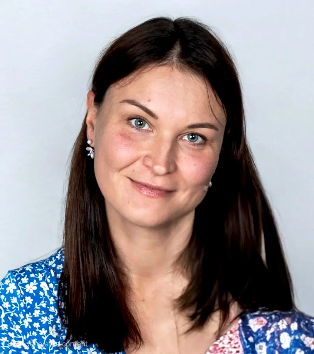 Smiling woman with long brown hair