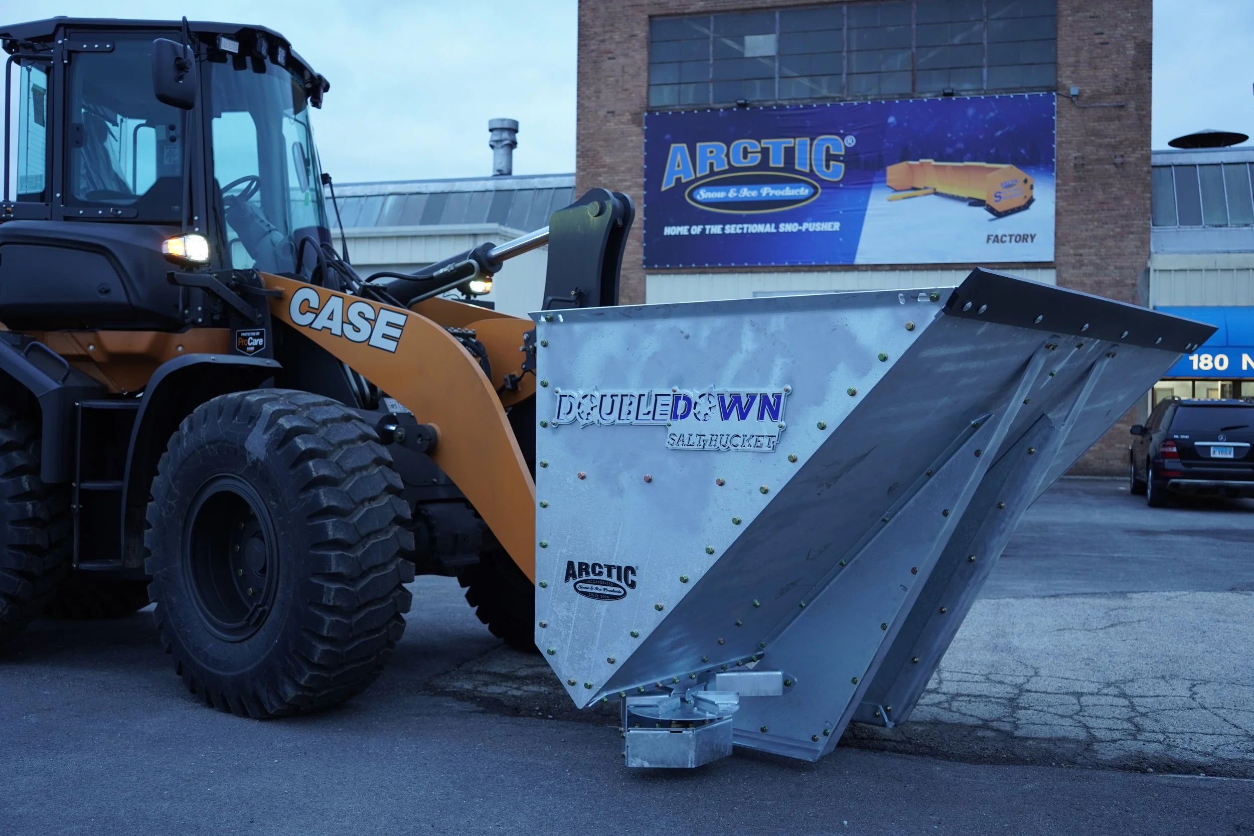 ARCTIC DoubleDown salt bucket on a front end loader