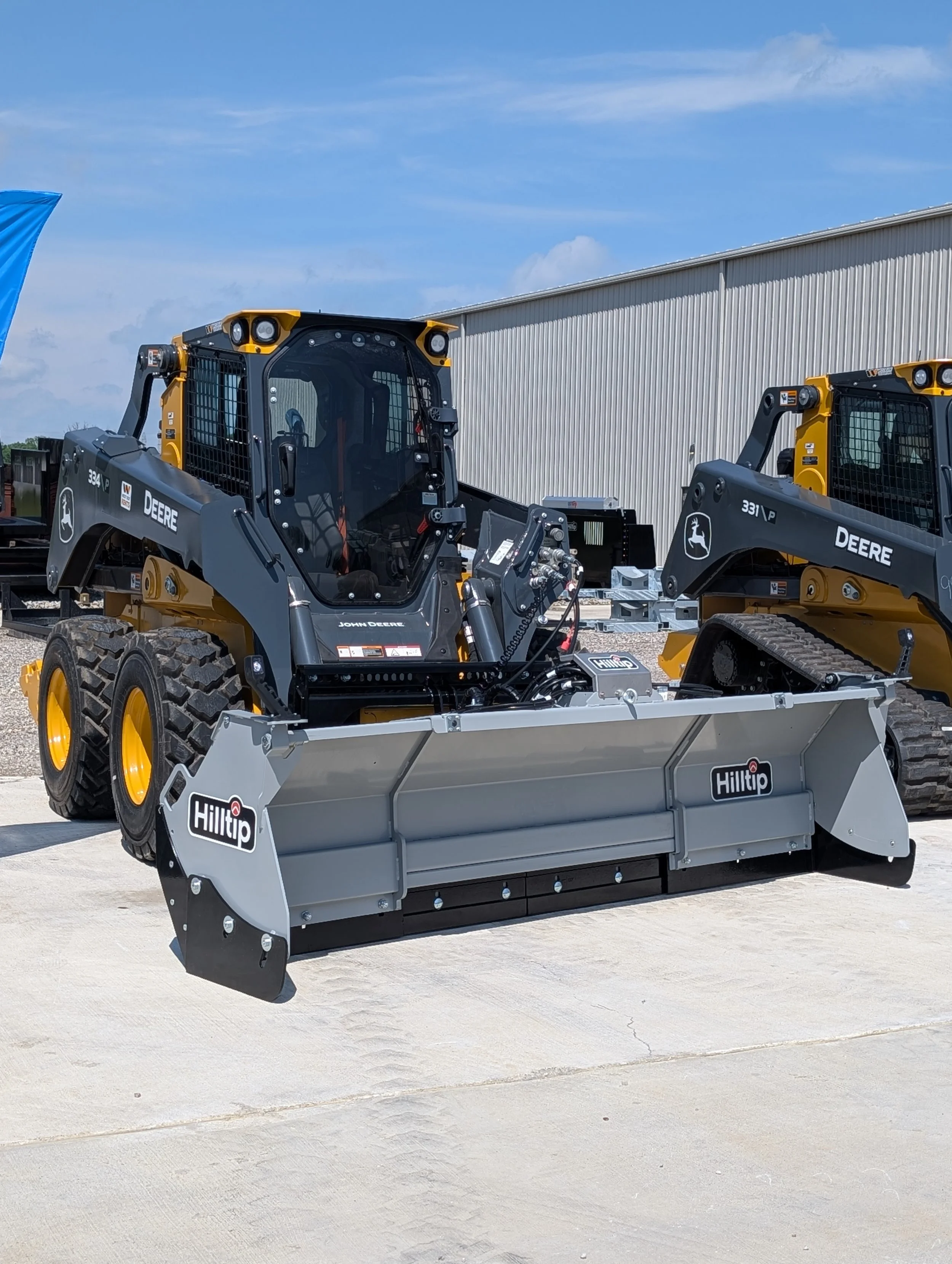 SnowStriker SFT Flex on a Deere Skid Steer