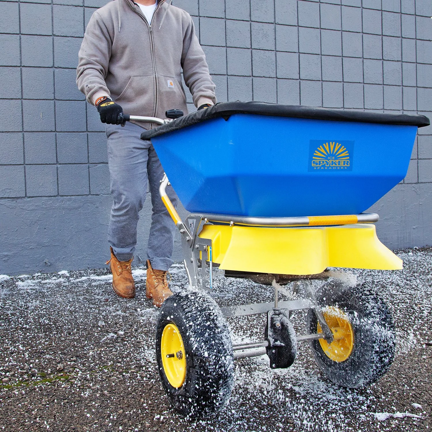 Action shot of a Spyker SPY100-2S spreading salt.
