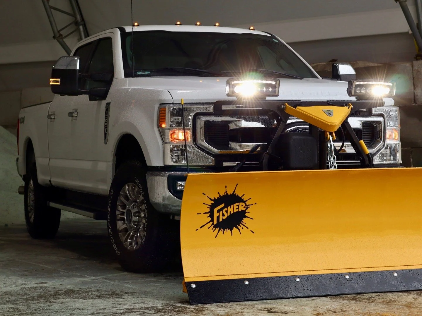 Beauty Shot of a Fisher HD2 snow plow Mounted to Ford F350 Pickup