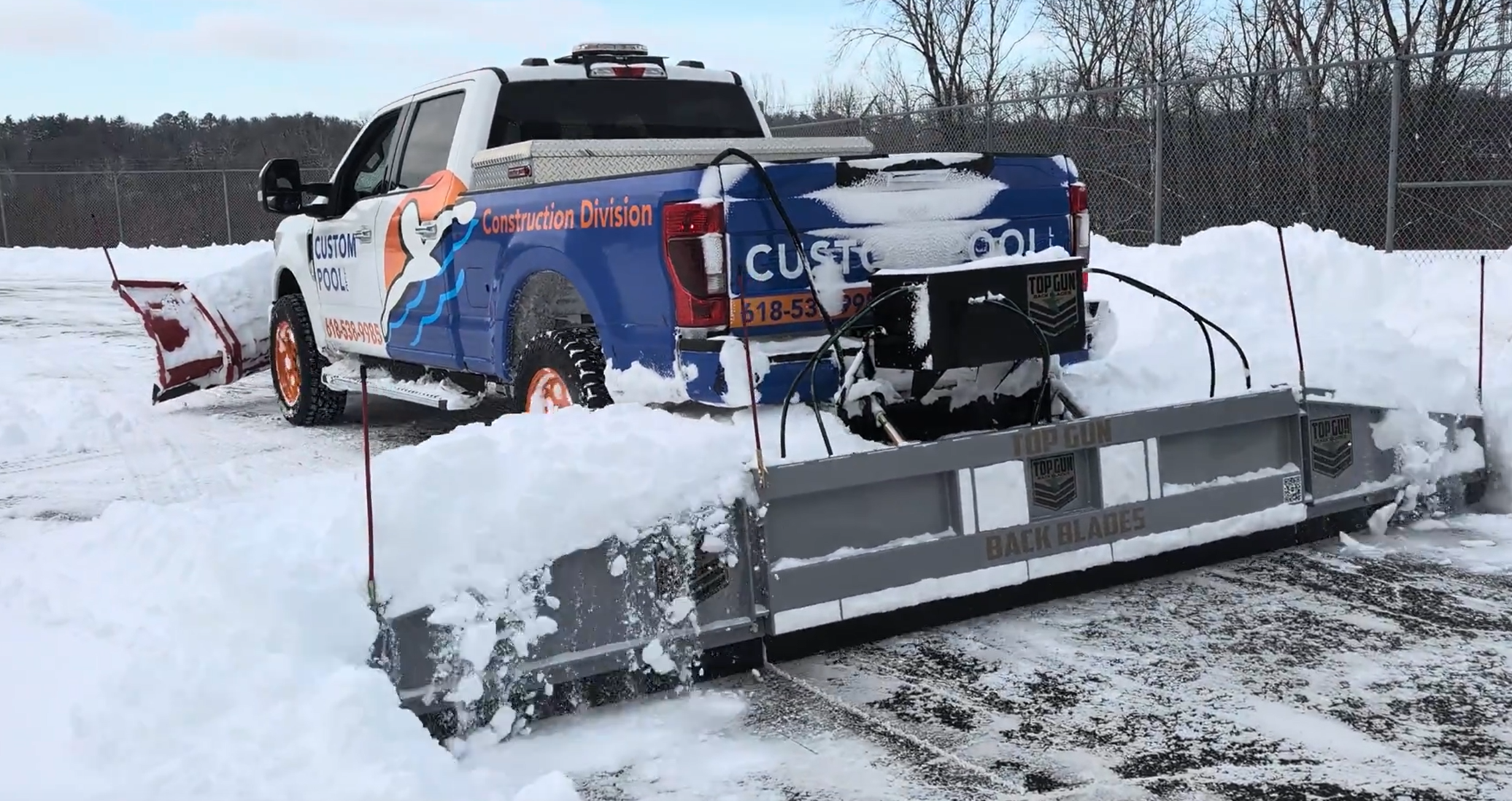 Action shot of top gun back blade on f250