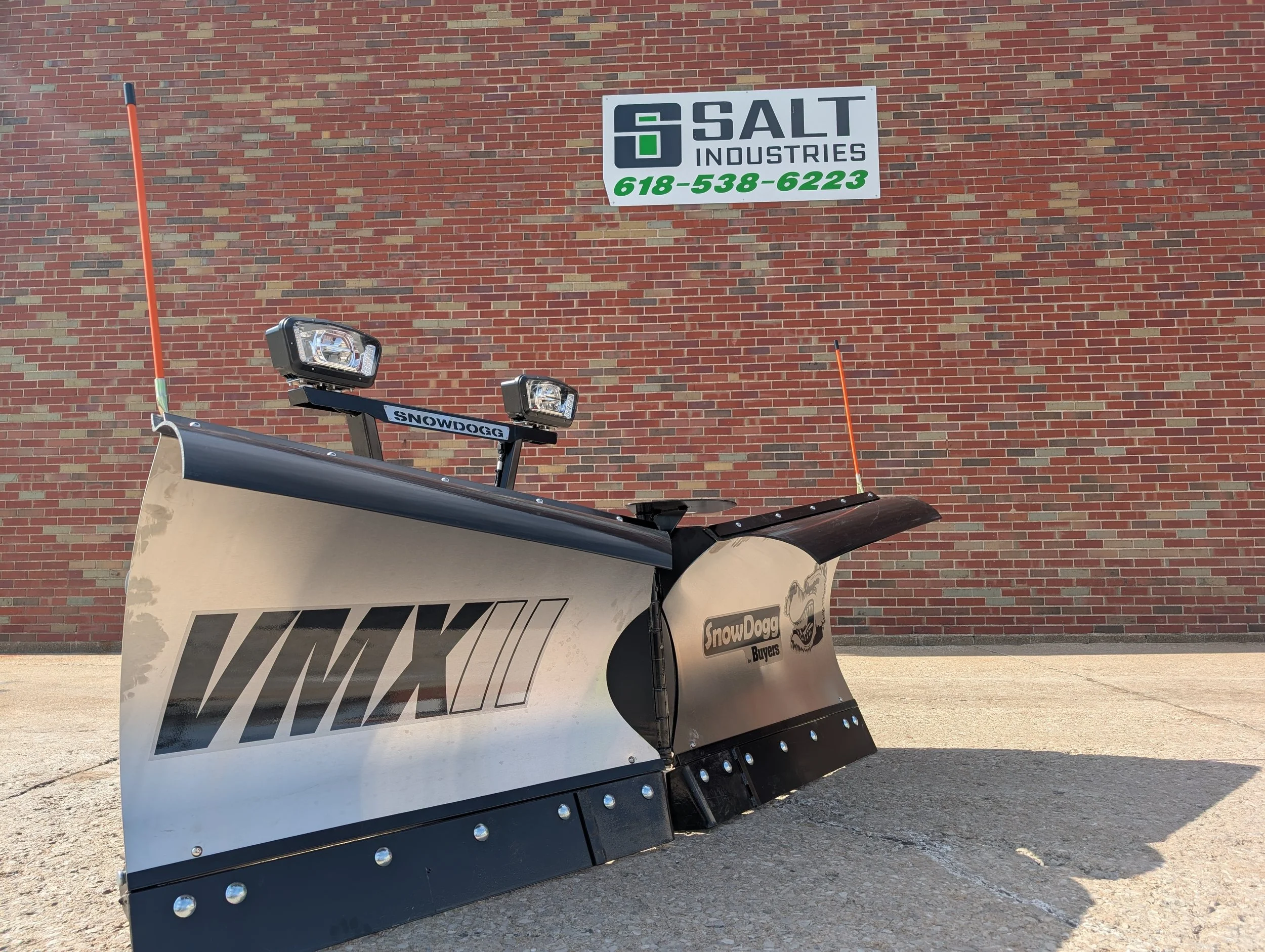 Product listing photo of a SnowDogg VMX75II V snow plow with LED headlights