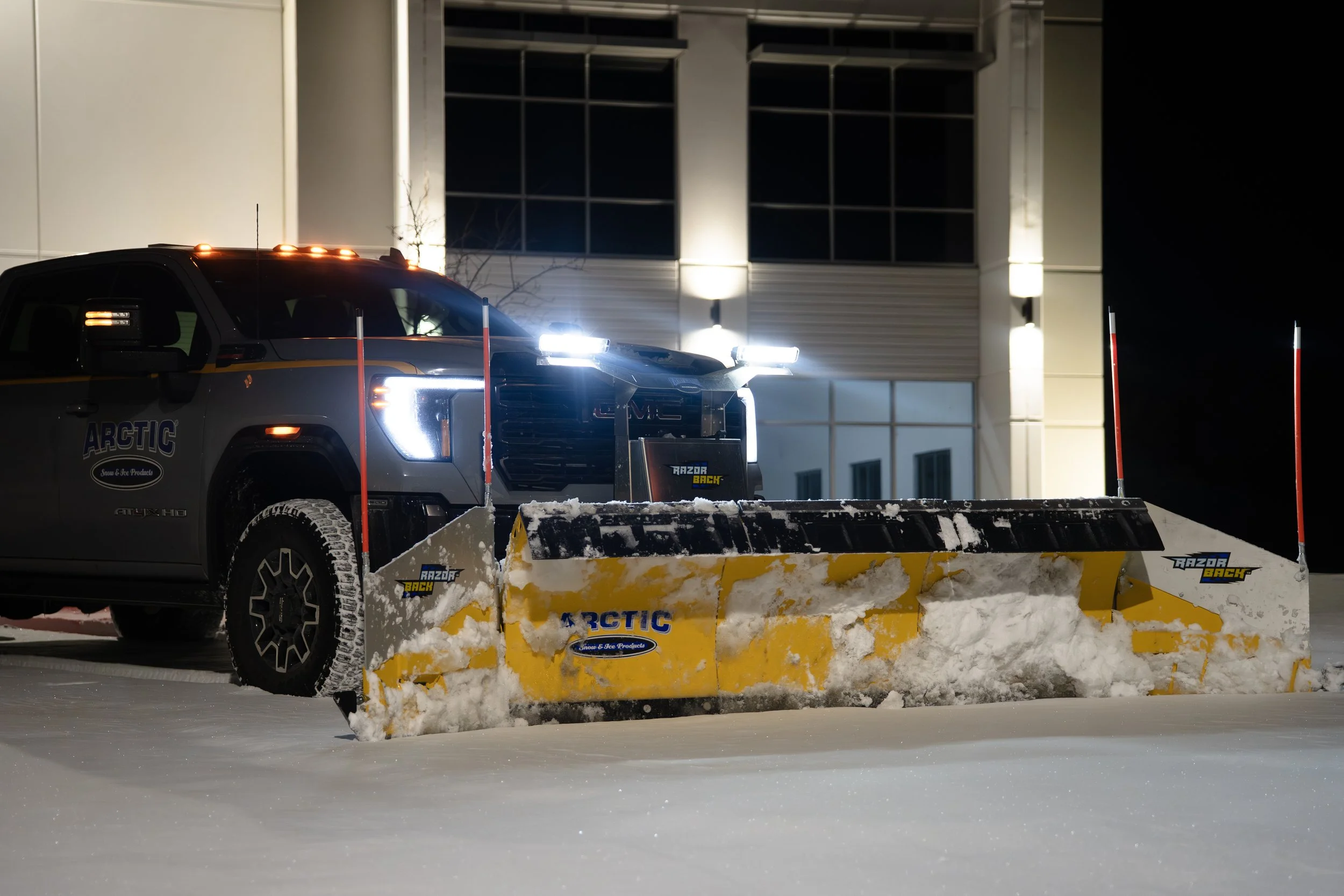 ARCTIC Razor Back snow plow on a GMC truck