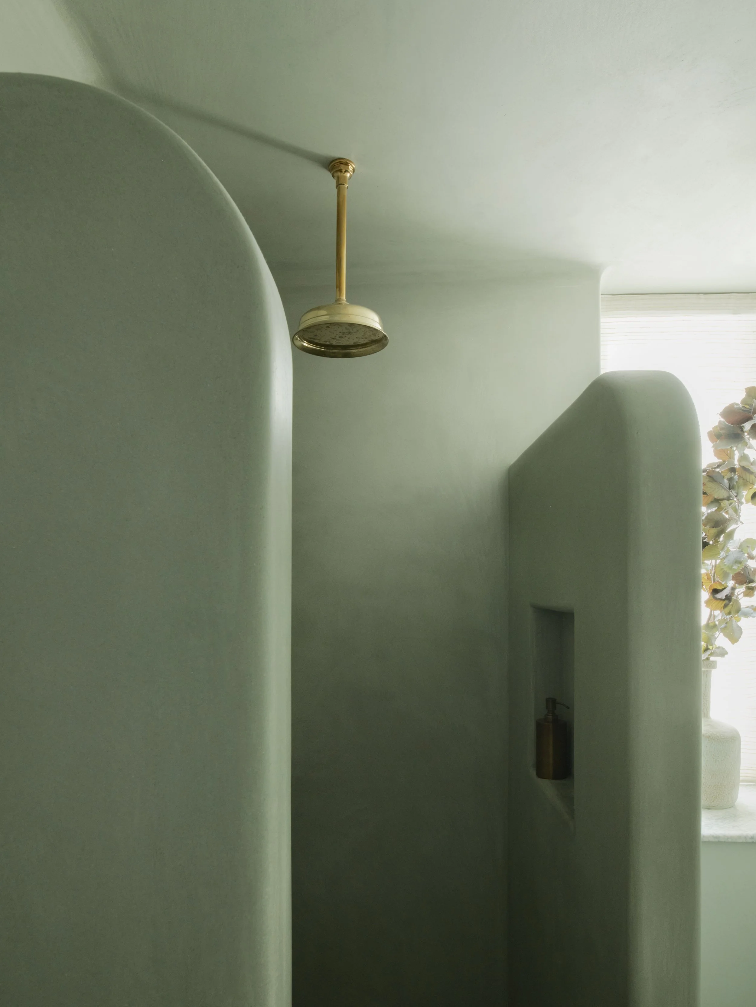 Shower area in a Moroccan style Tadelakt finish.