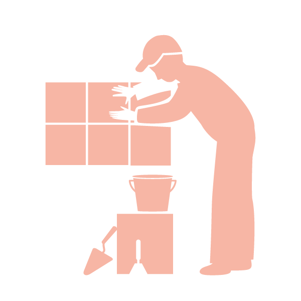 Person harvesting crops into a bucket, using a small shovel, with plants growing in boxes behind.