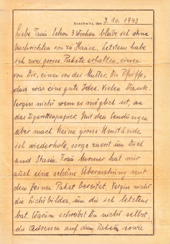 Handwritten letter dated October 3, 1943, from Auschwitz, written in German, describing receiving and sending packages, mentioning conditions, and personal sentiments.