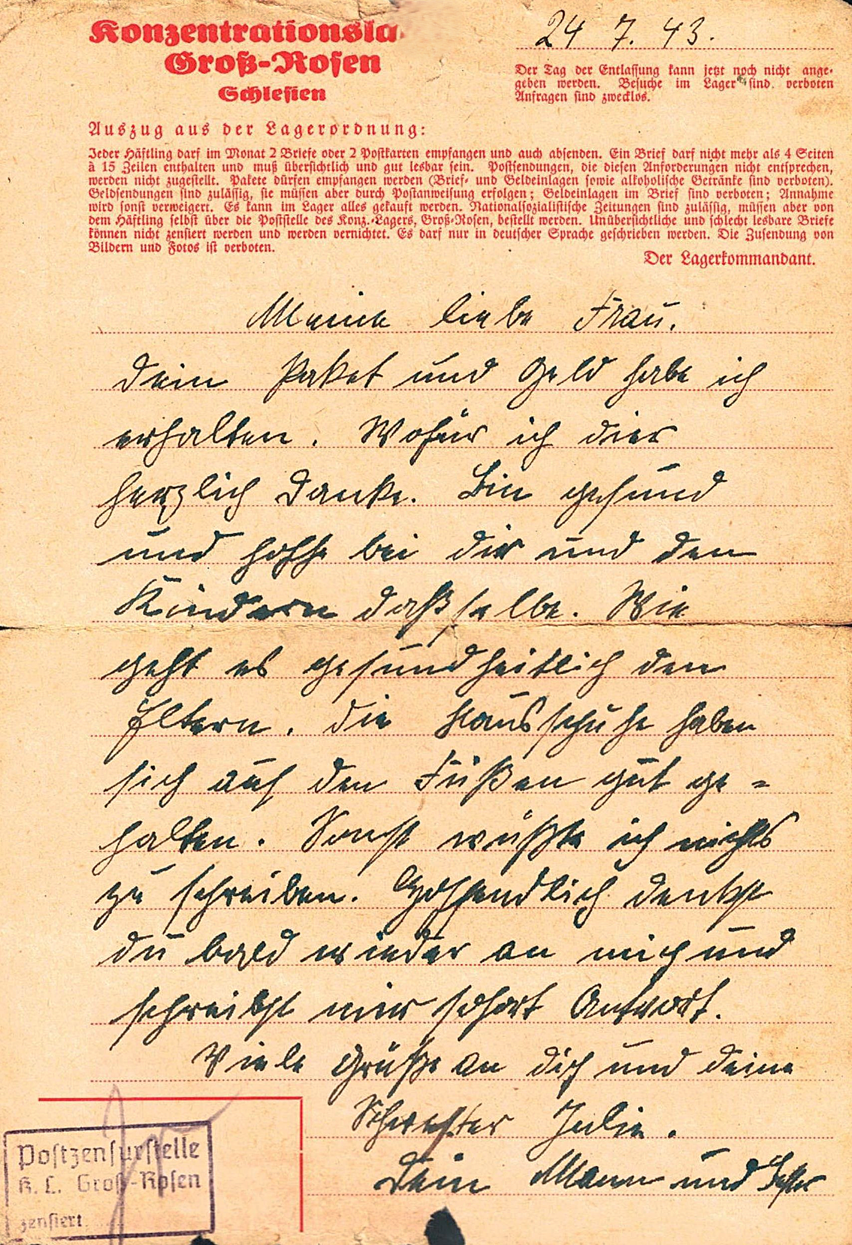 A handwritten letter in German on aged paper from 1943 with a red header and a purple stamp in the lower left corner.