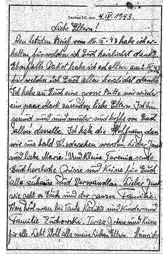 Handwritten letter in German from Dachau, dated October 4, 1943, addressed to parents, mentioning receiving a package, health, and family updates.