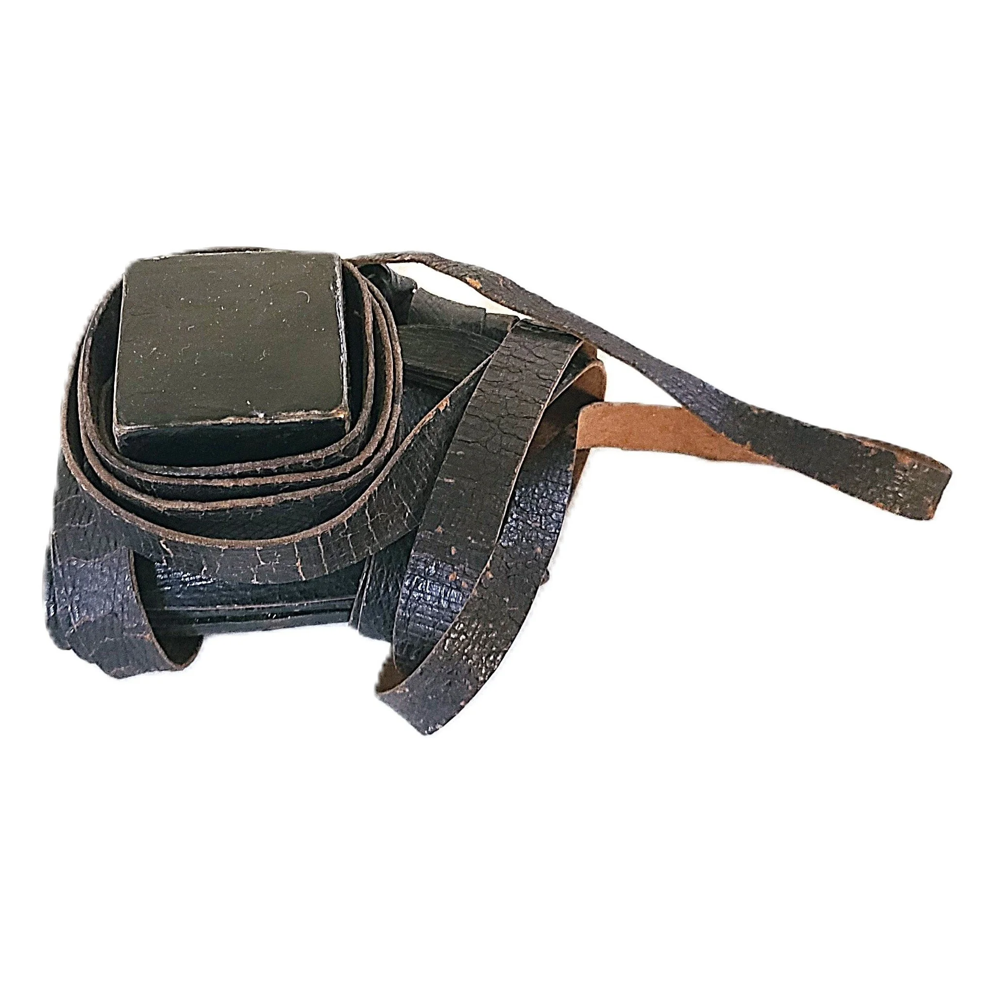 A coiled black leather strap with a metallic square buckle on top.