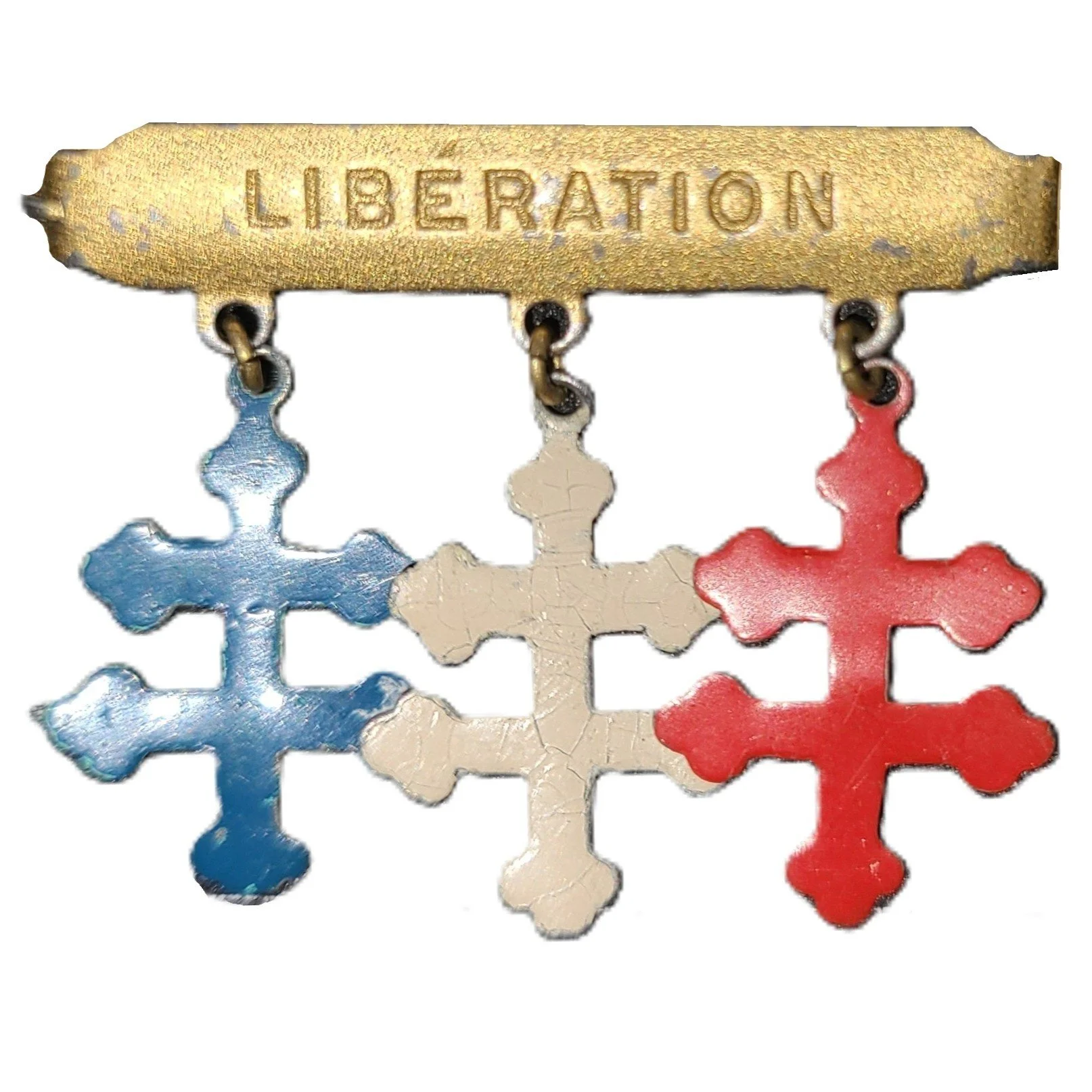 A metal medal with a gold rectangular top engraved with the word 'LIBERATION'; three snowflake-shaped charms hanging below in blue, white, and red colors.