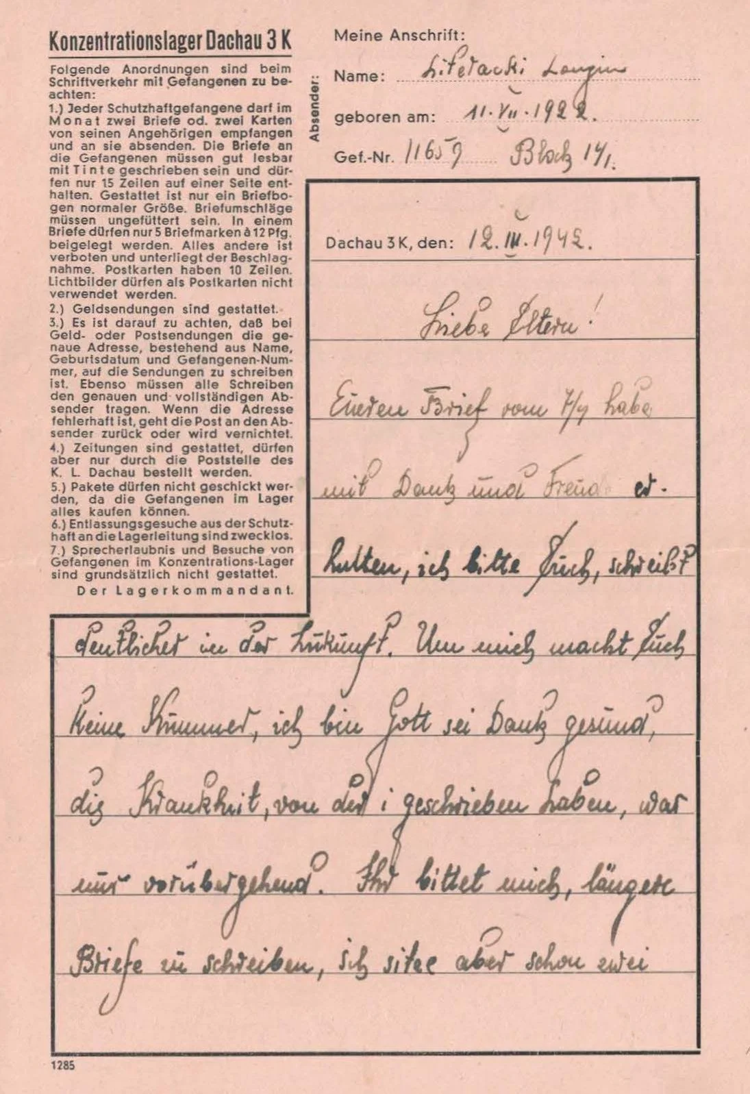 A handwritten letter in German on a pink paper with pre-printed instructions and a section for the sender's address.