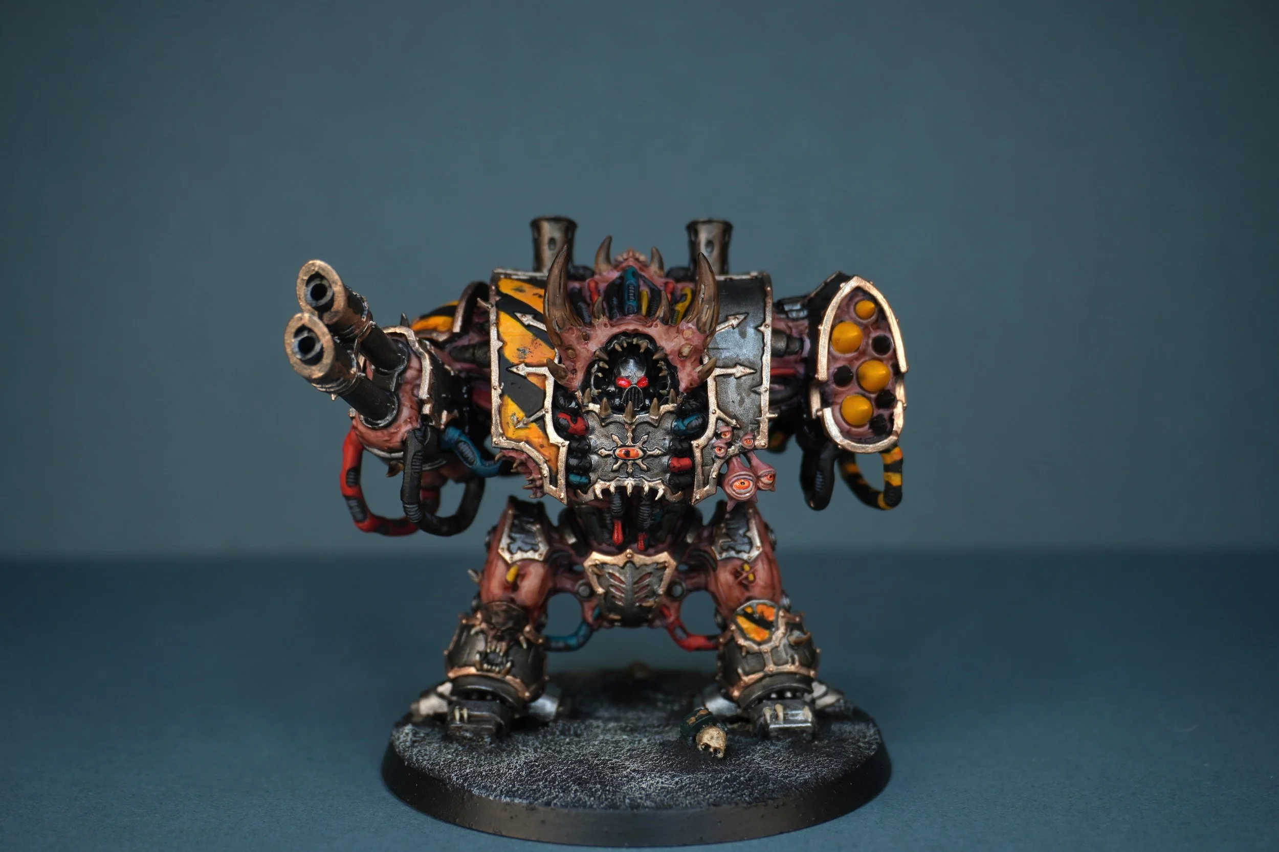 A Hell brute painted in Iron Hand colours with burnt skin, Hazard stripes and wires piercing in to the flesh.