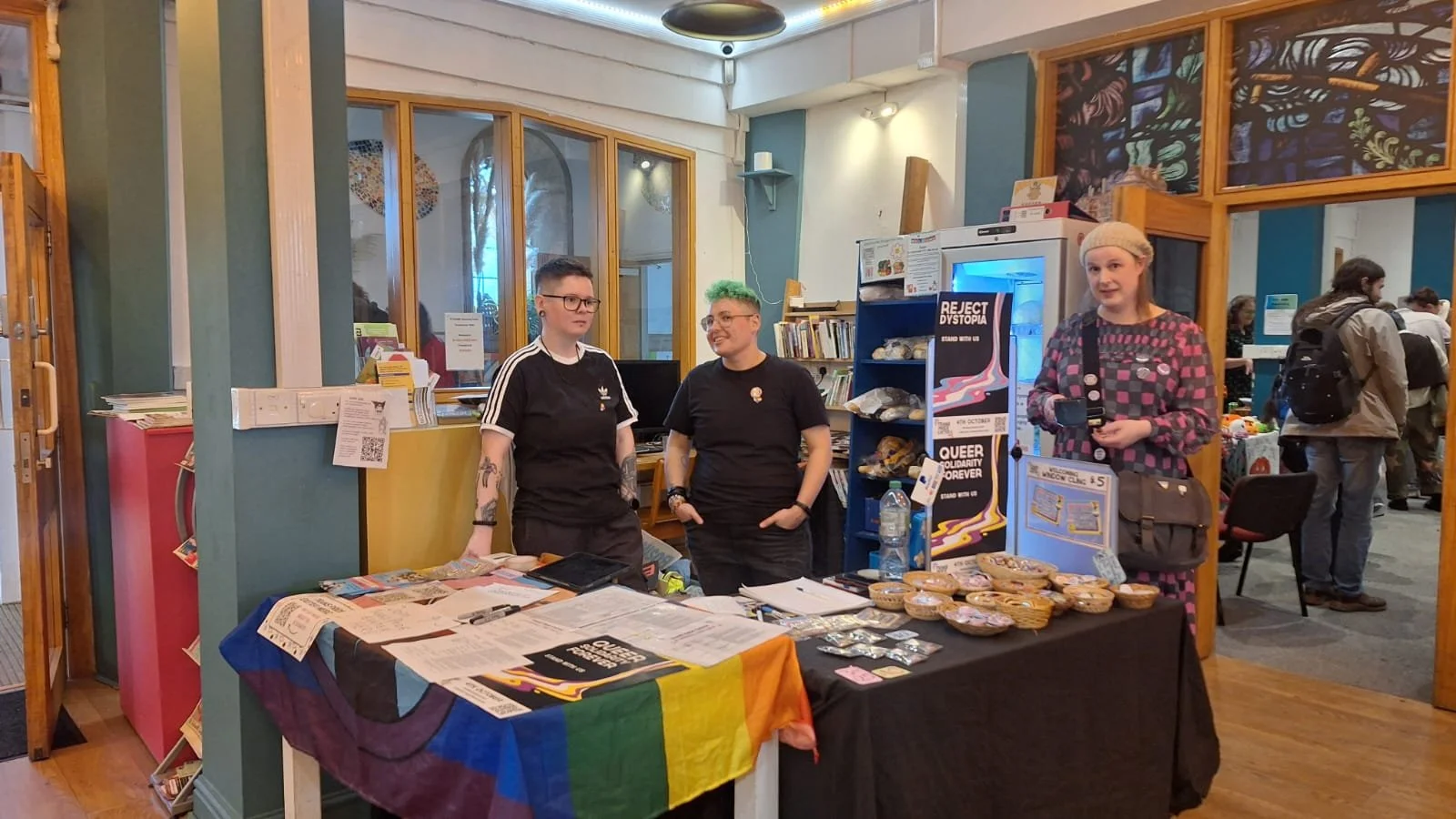 Some of the Trans Pride Exeter team at the front desk of the community day