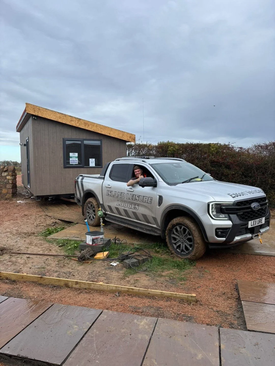 The last lodge we sited at Falside Mill was all sunshine... But the team are still loving every minute 🌧️🛠️