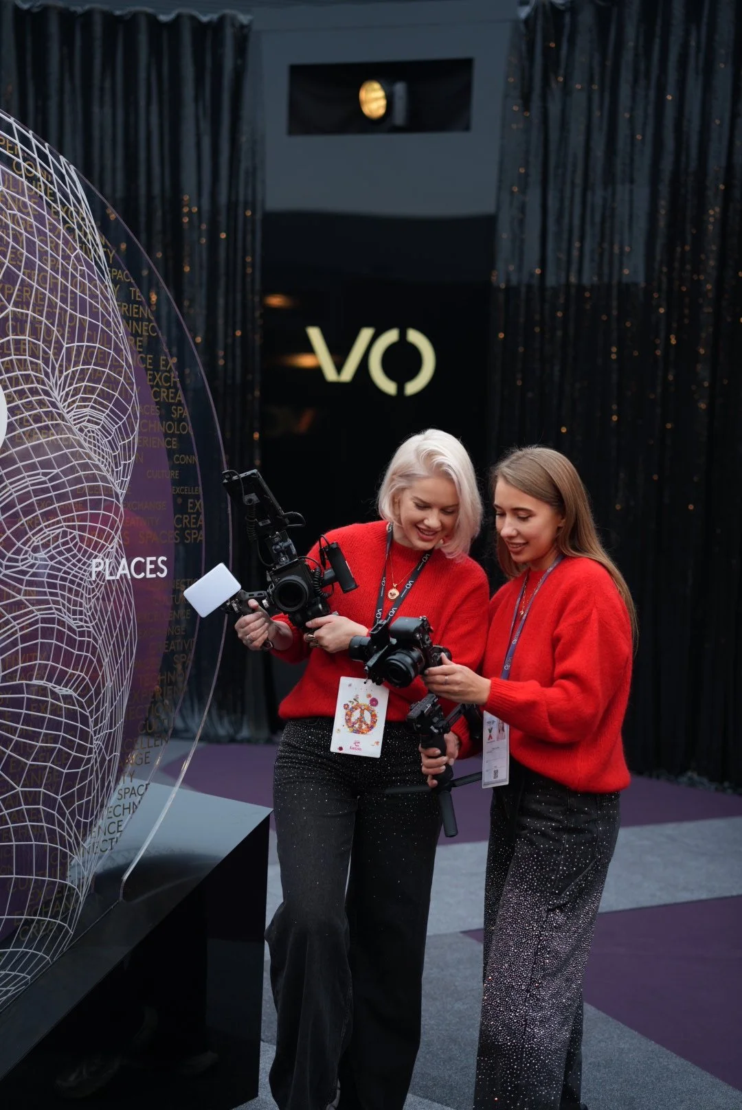 New Moon Agency at Vicenza Oro 2026 — Lena and Kateryna with professional camera equipment