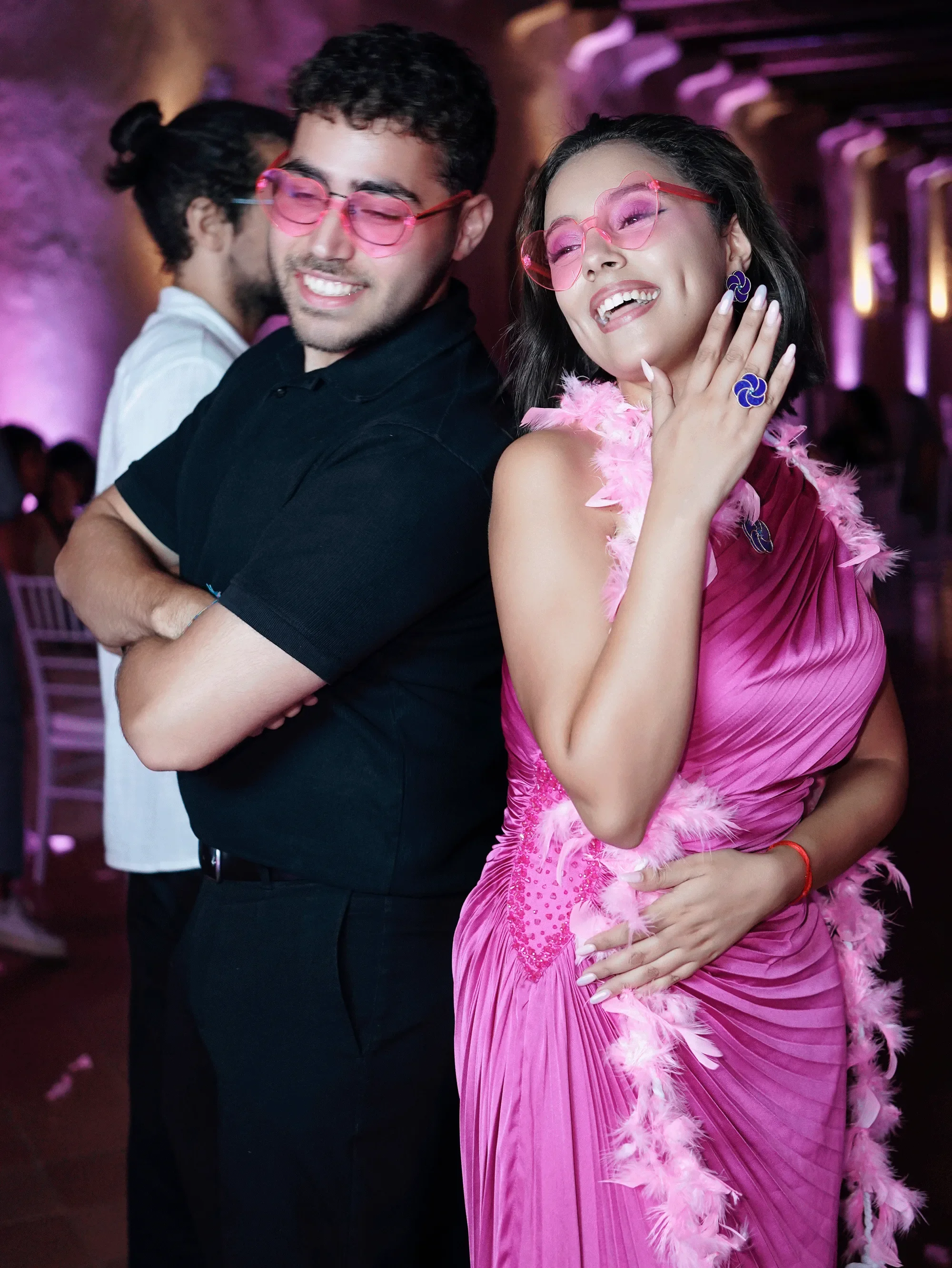 Guests at gala evening in pink outfits — event photography New Moon Agency Klagenfurt