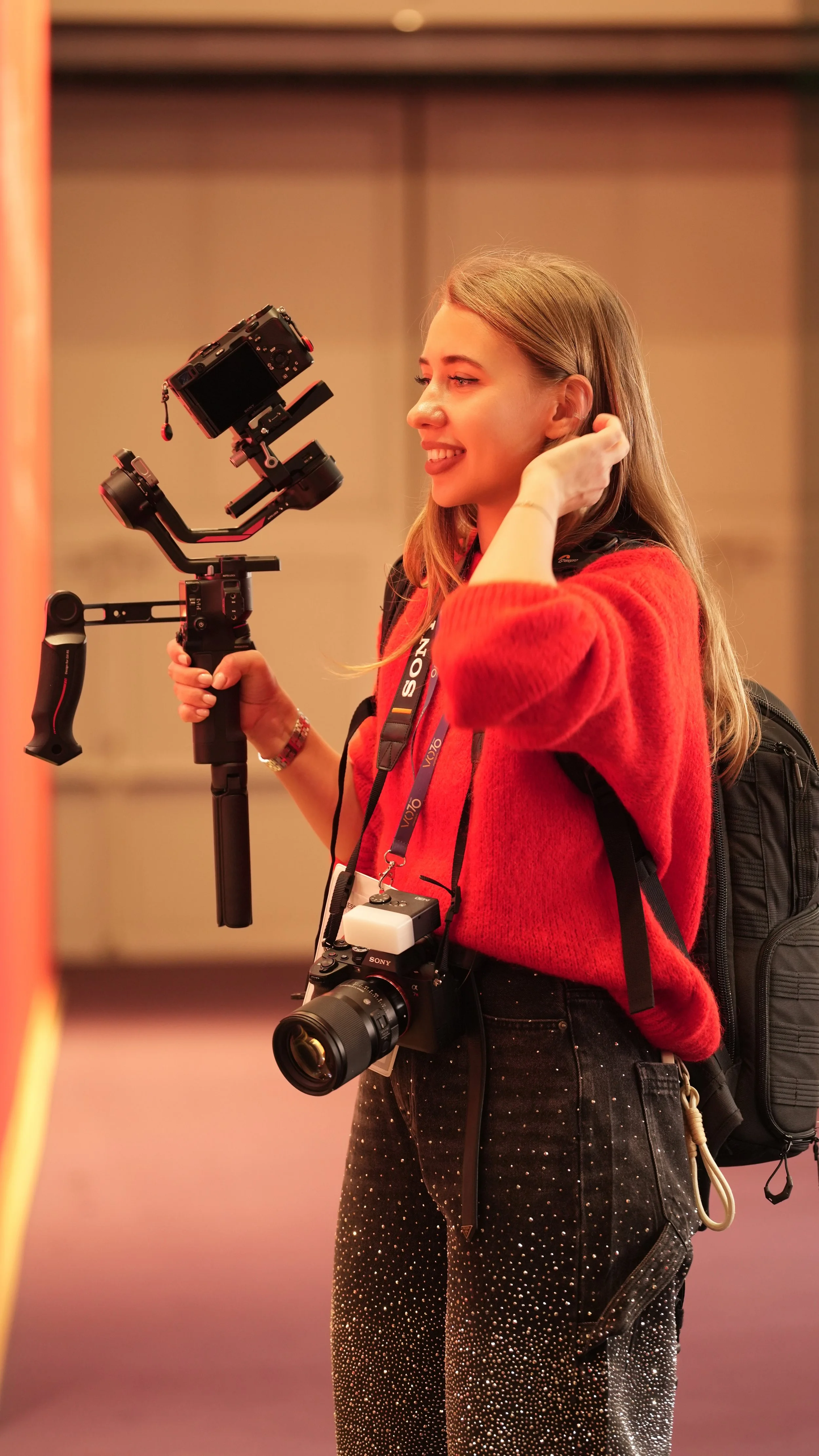 Lena with video gimbal at Vicenza Oro 2026 — New Moon Agency videographer