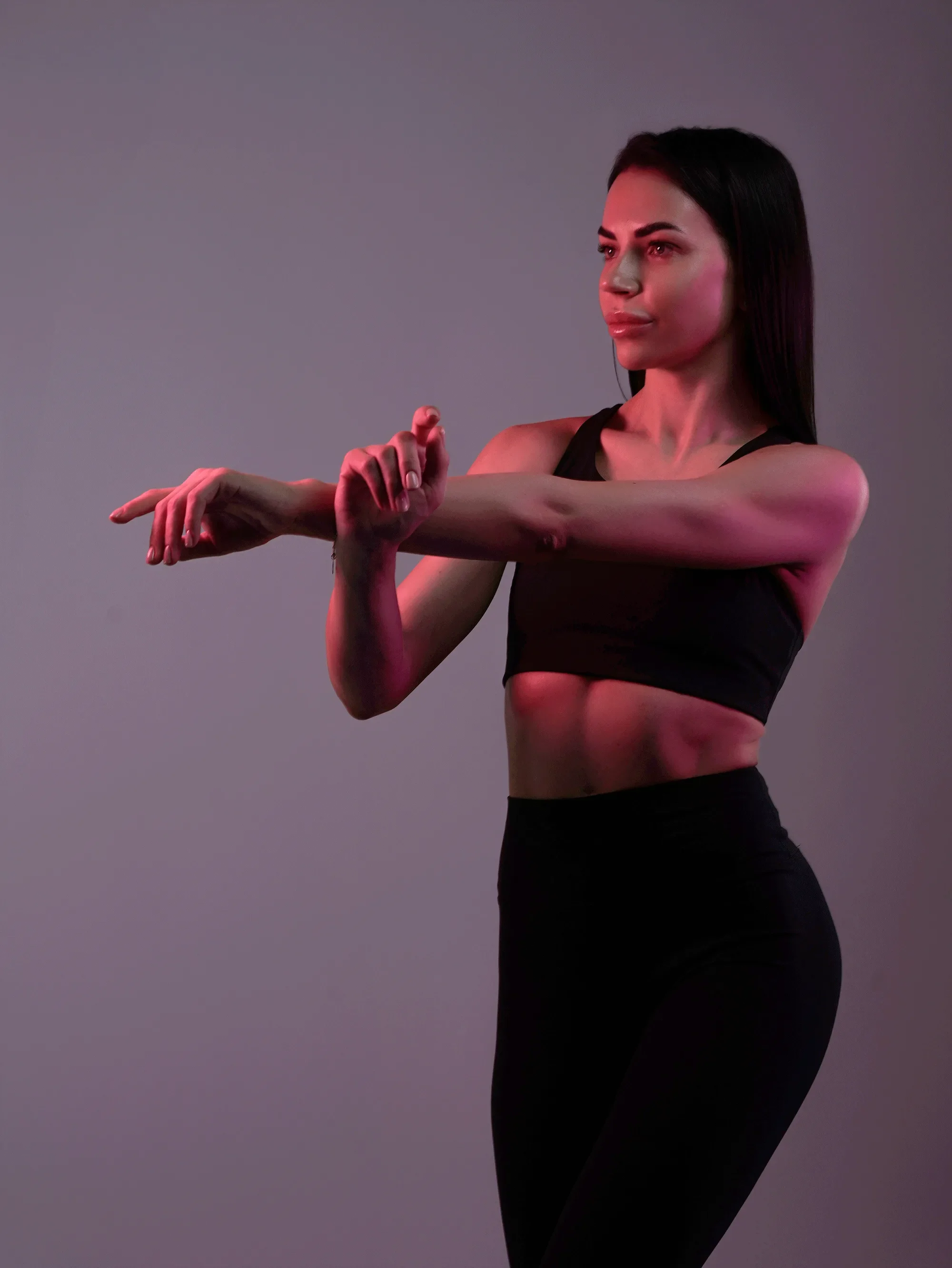 Female trainer martial arts pose — sport fitness photography New Moon Agency Klagenfurt