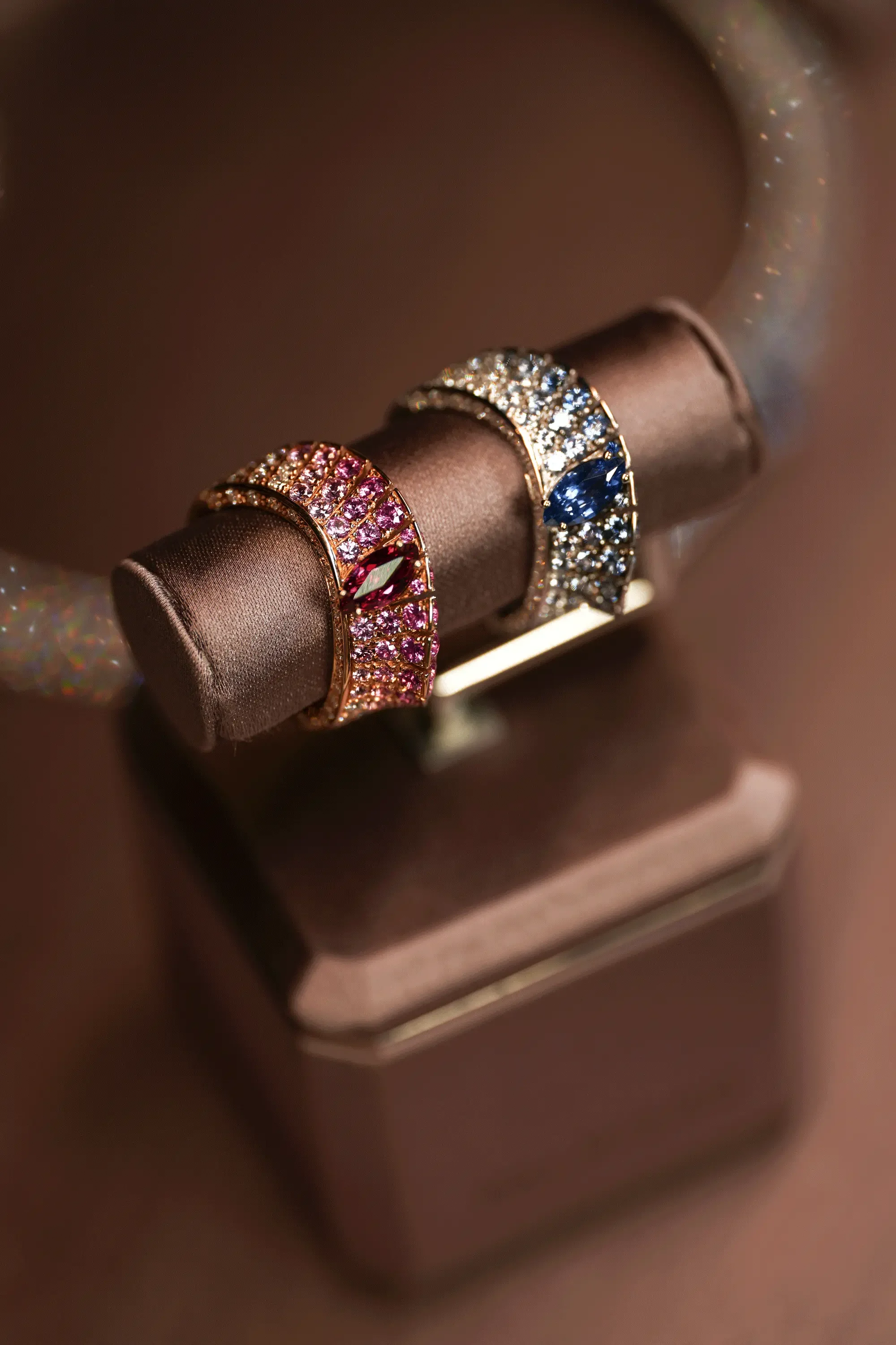 Diamond and gemstone rings on display stand — jewellery photography New Moon Agency Klagenfurt