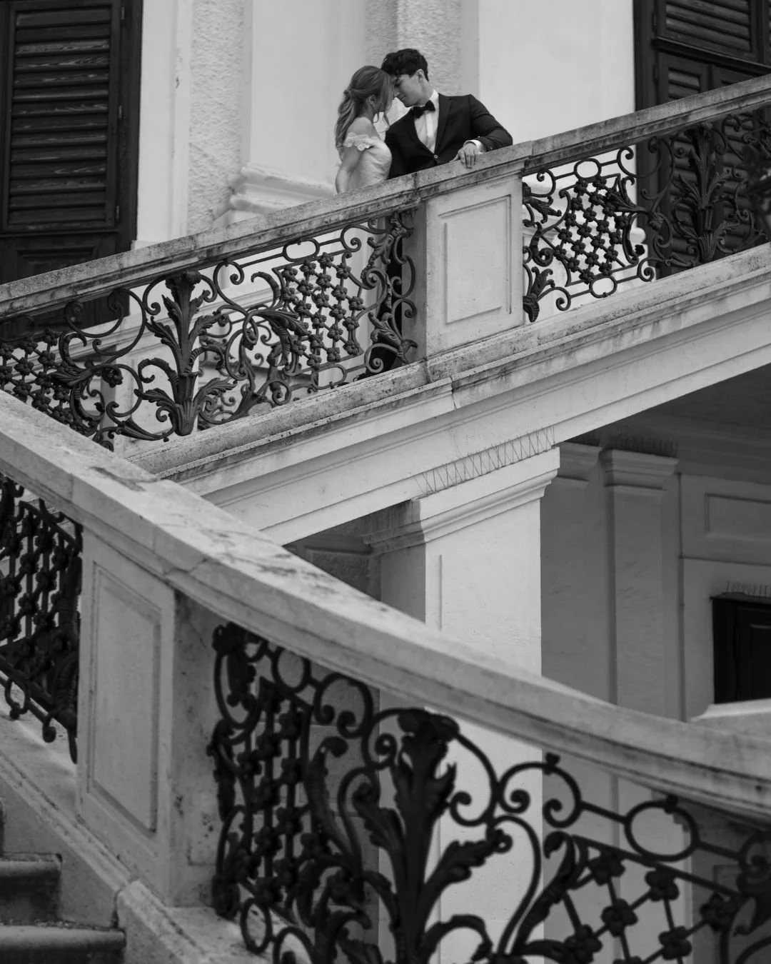 🏛️ Architecture is the silent storyteller.

Every curve of a railing, every shadow, every line of stone becomes part of the frame. This is where romance meets structure &ndash; creating imagery that feels both editorial and deeply emotional.

Throug