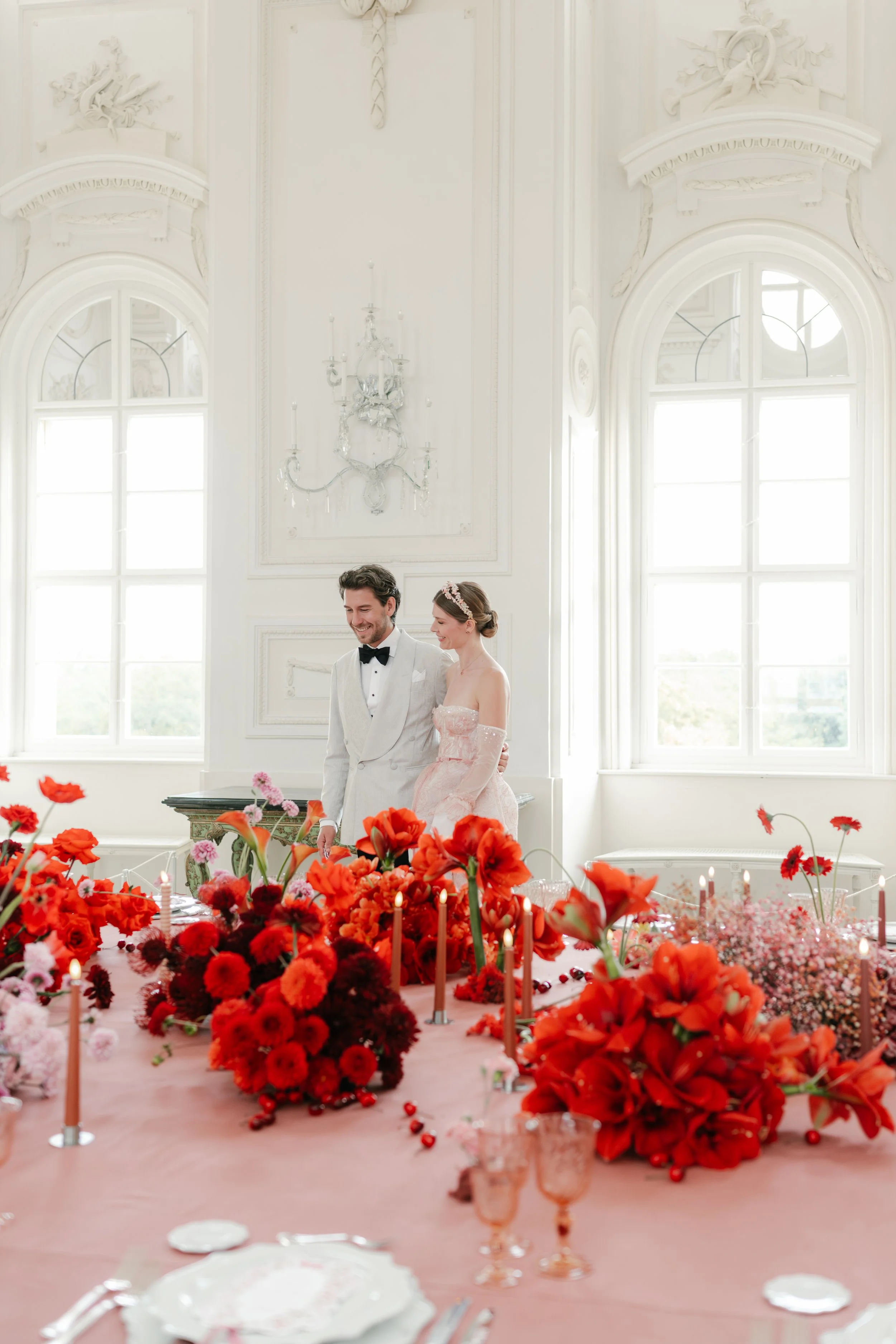 wedding couple walking in the castle garden