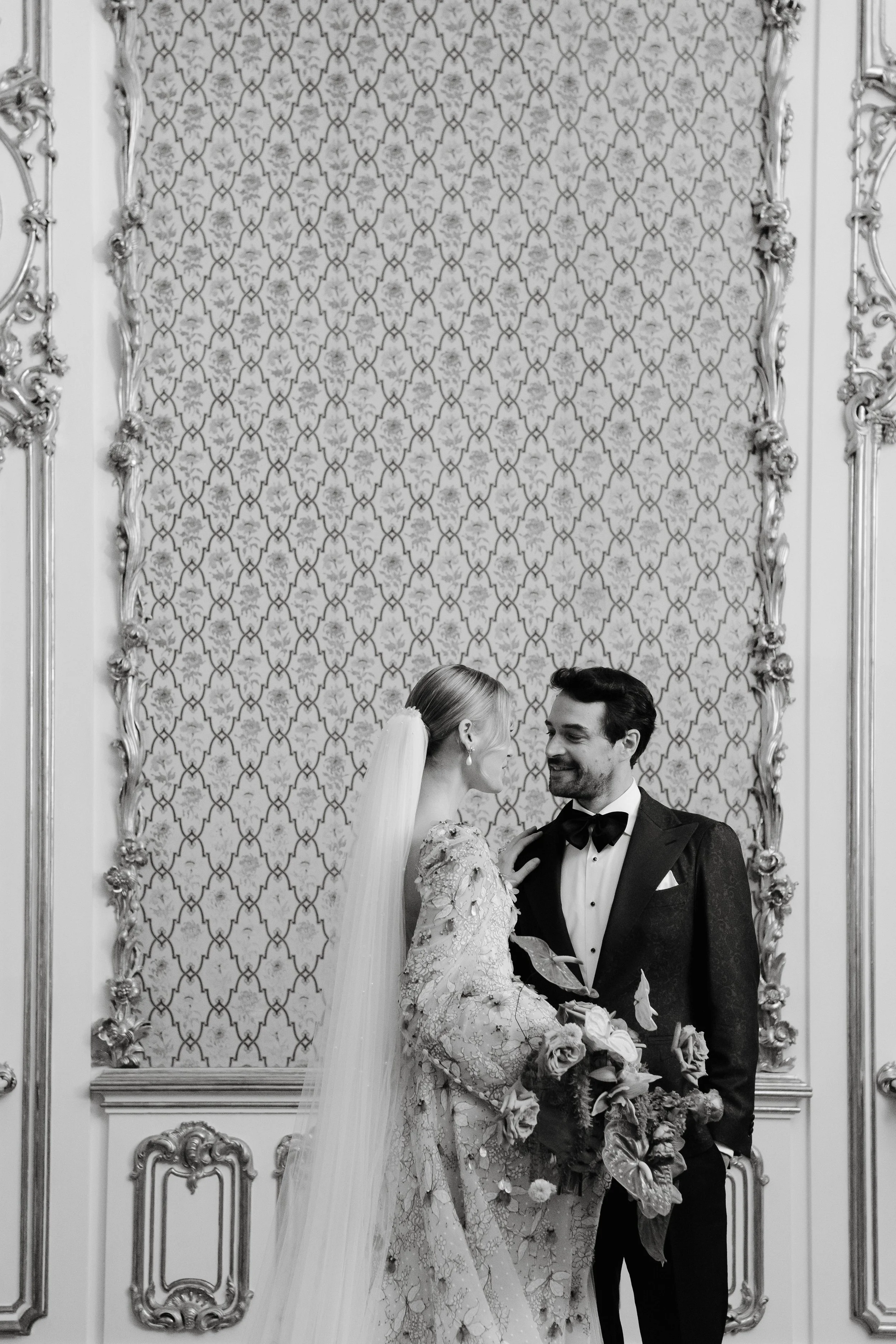 couple standing and looking each other in a castle