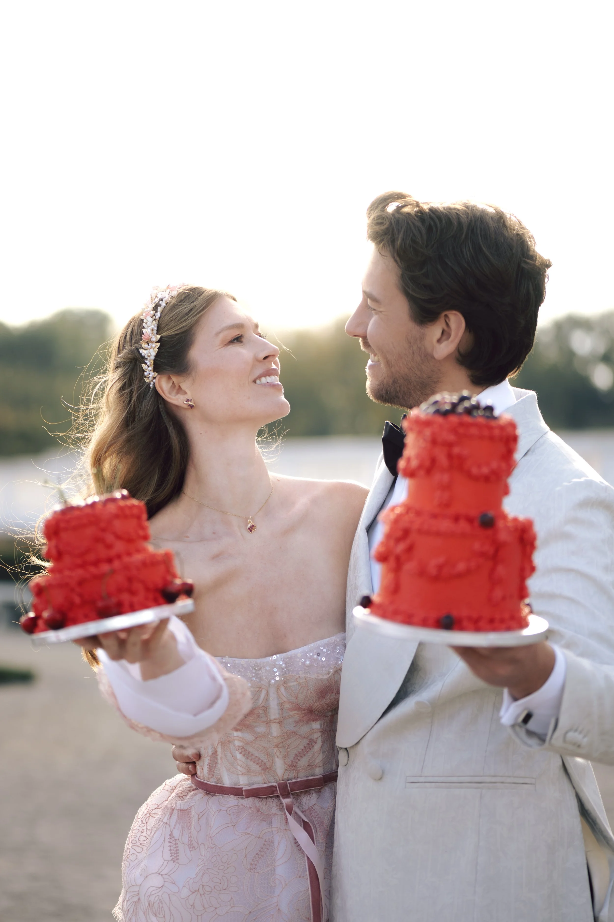 wedding couple posing in a castle garden