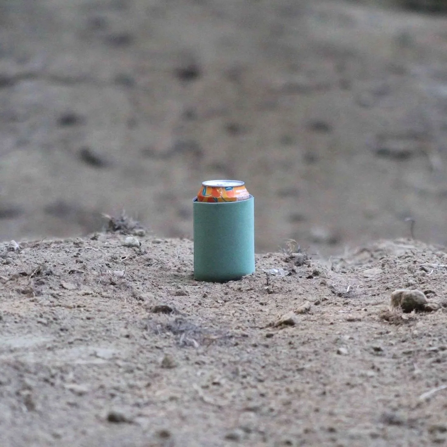 4-ELEVEN-7 Fab can koozie with logo. Perfect for off-road trips, campsites, and everyday use. Adventure-ready drink accessory.