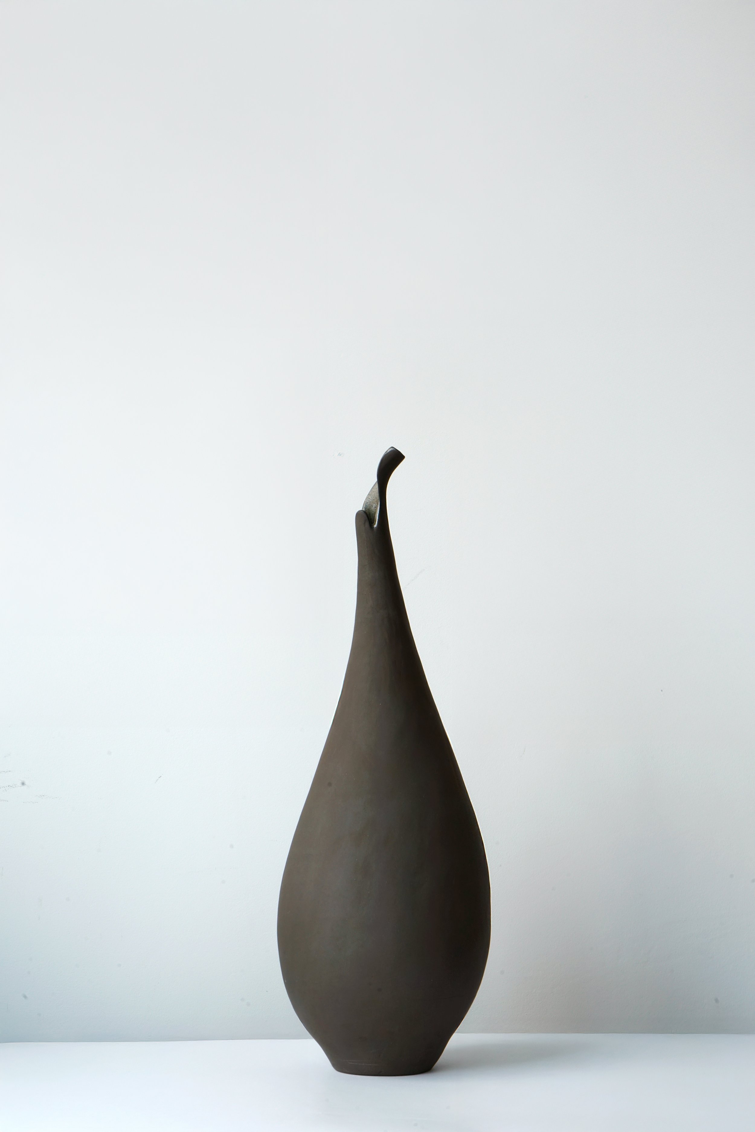 Untitled, 2025, Volcano black stoneware, glaze, 56 x 17.8 x 17.8 cm