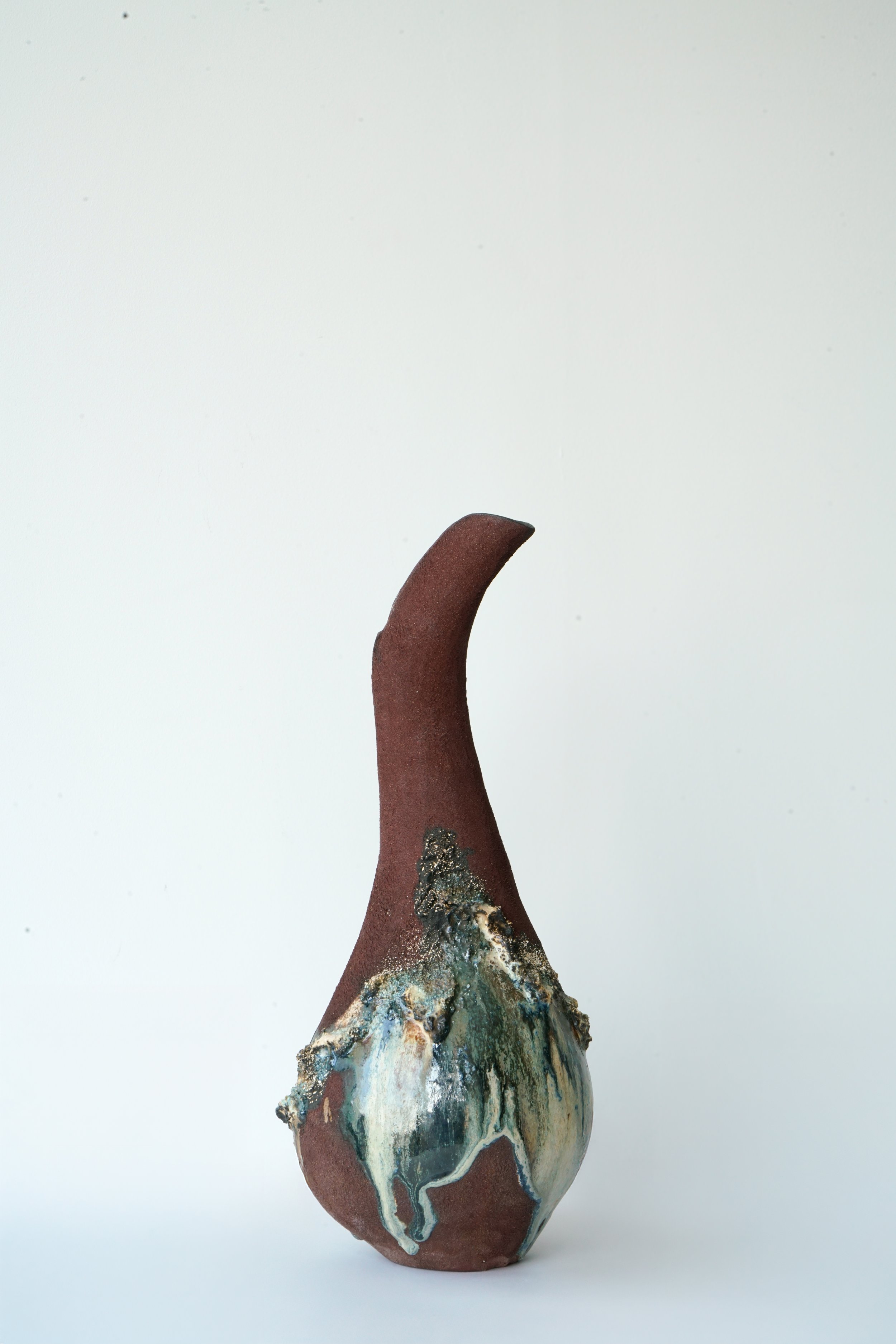 Untitled, 2025, Red stoneware, Volcano black stoneware, sand, glaze, 38 x 16 x 16 cm
