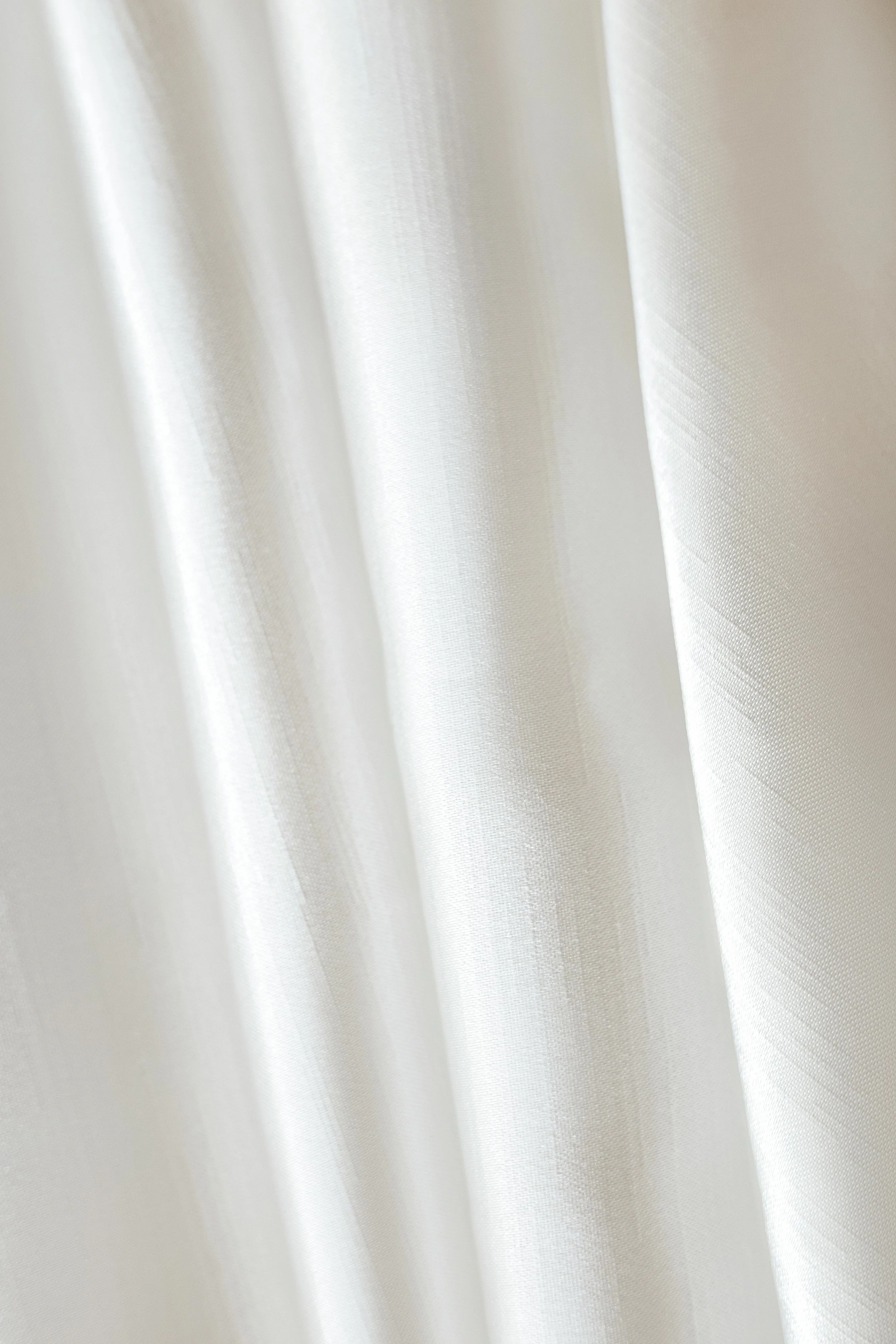 close up picture of white curtains