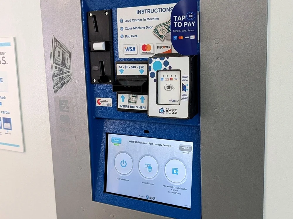 Estacion de pago de WSHFLD Laundry para efectivo, tarjeta, tap y pagos por app.