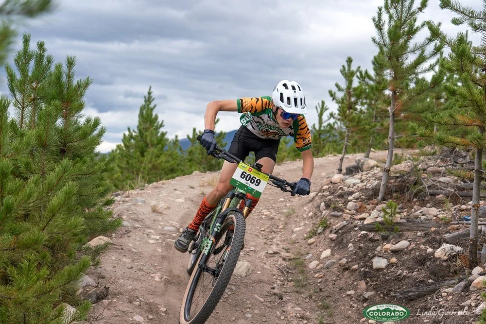 student competing in mountain biking