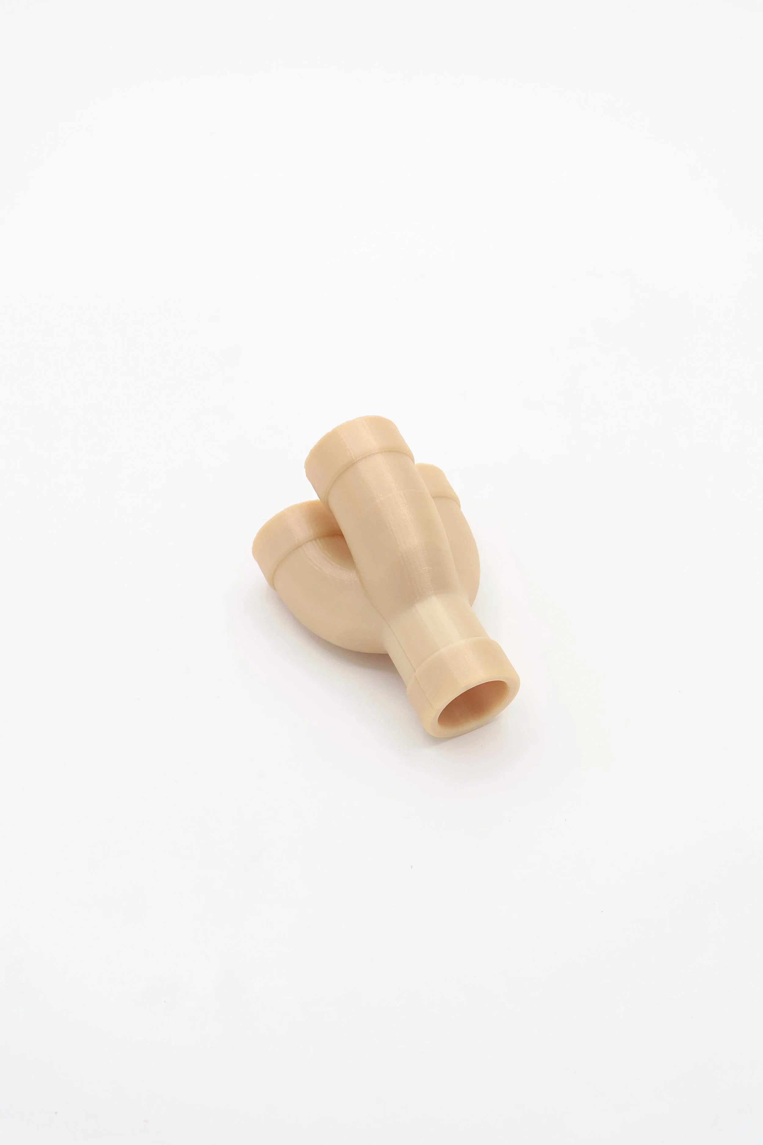 A connector 3D printed from aerospace grade plastic, ULTEM 9085.