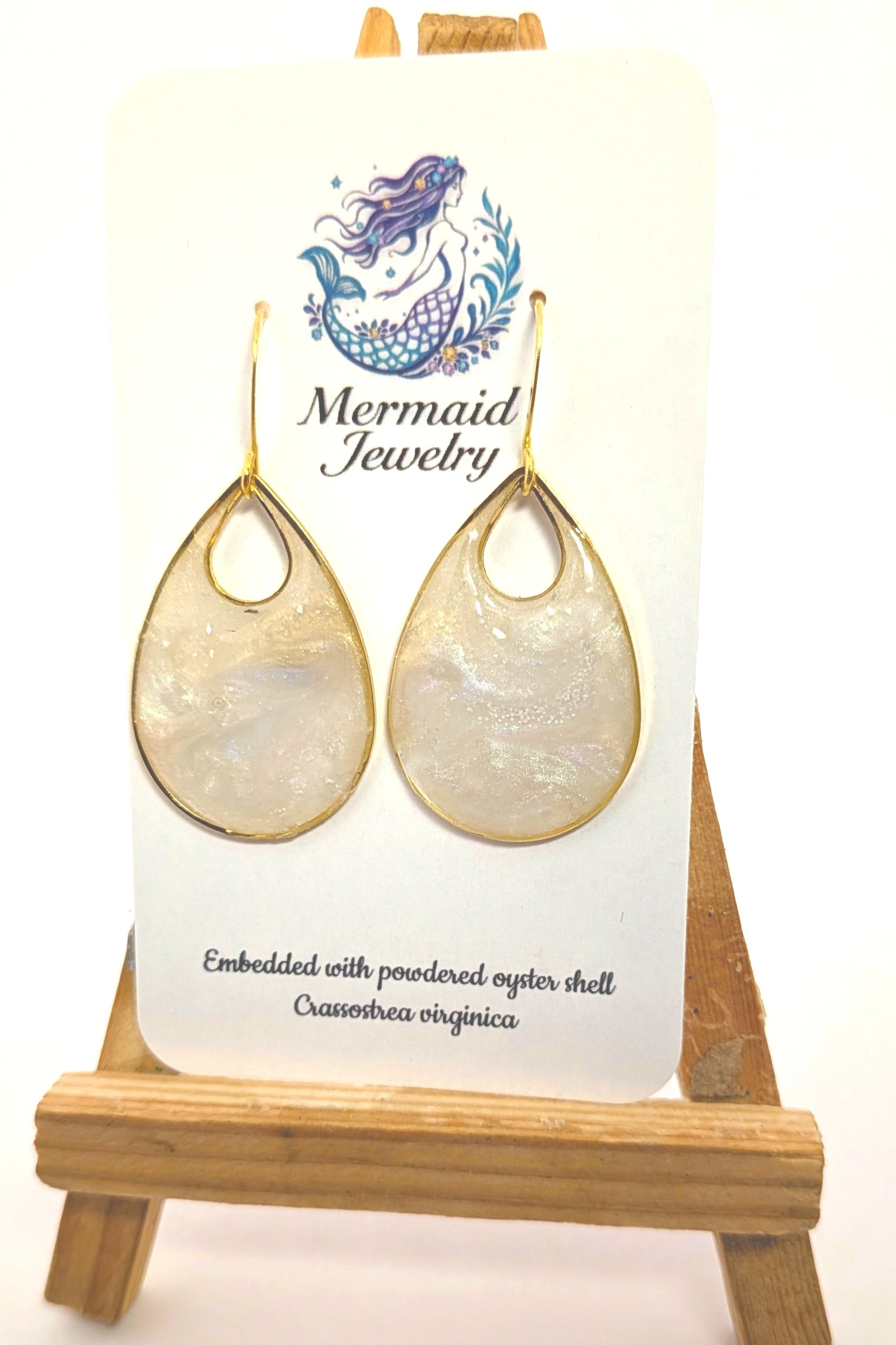 Whispers of the sea live within each design—powdered oyster shell, kissed by pigment, conjuring shimmer, texture, and depths that echo the ocean floor.