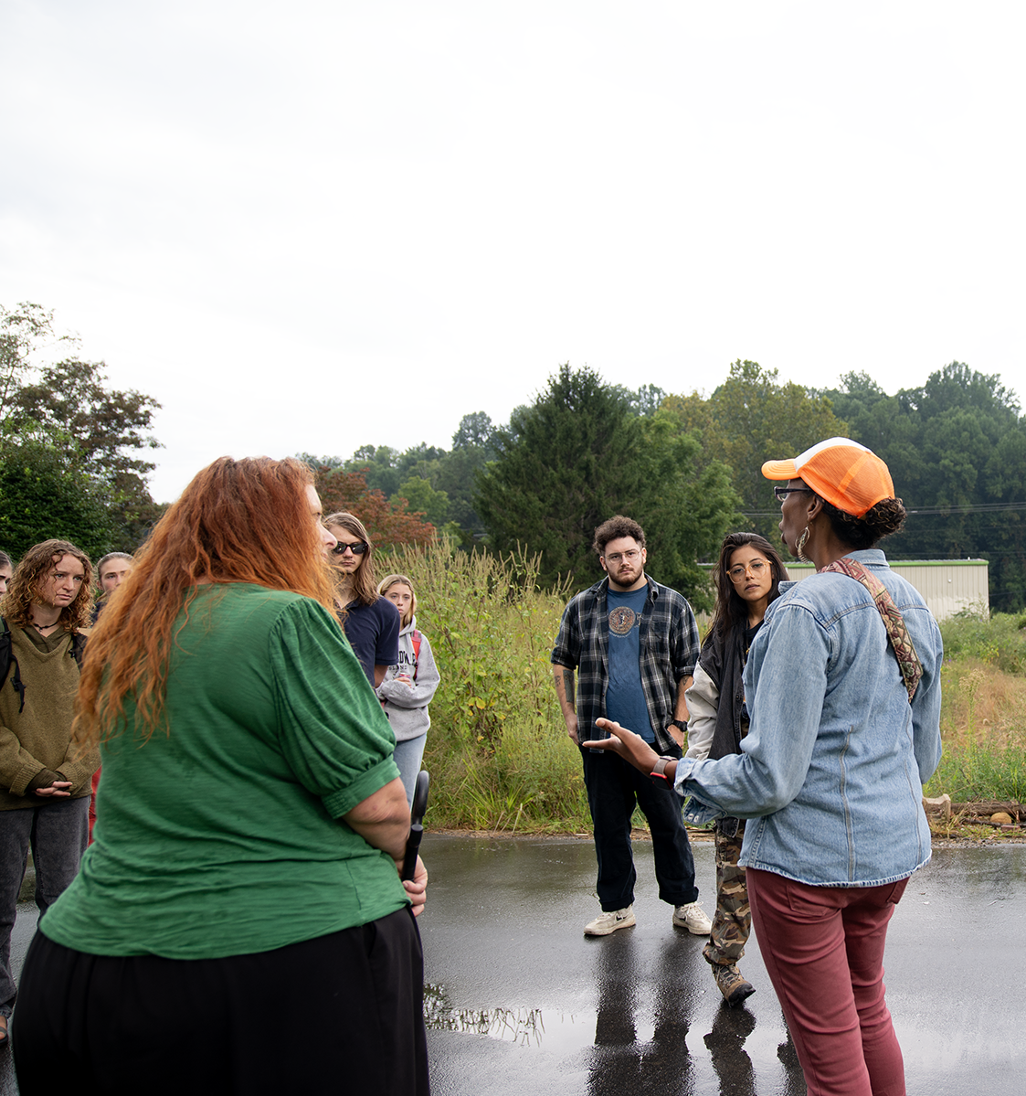 The Hub staff and board members hosting a Resilience Tour of Downtown Swannanoa for new students at Warren Wilson College. 