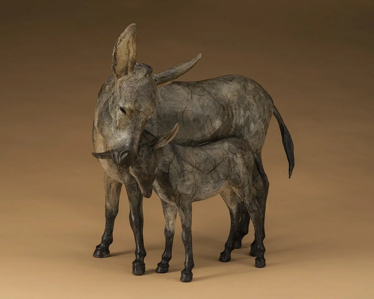 Nuzzling+Burros.webp