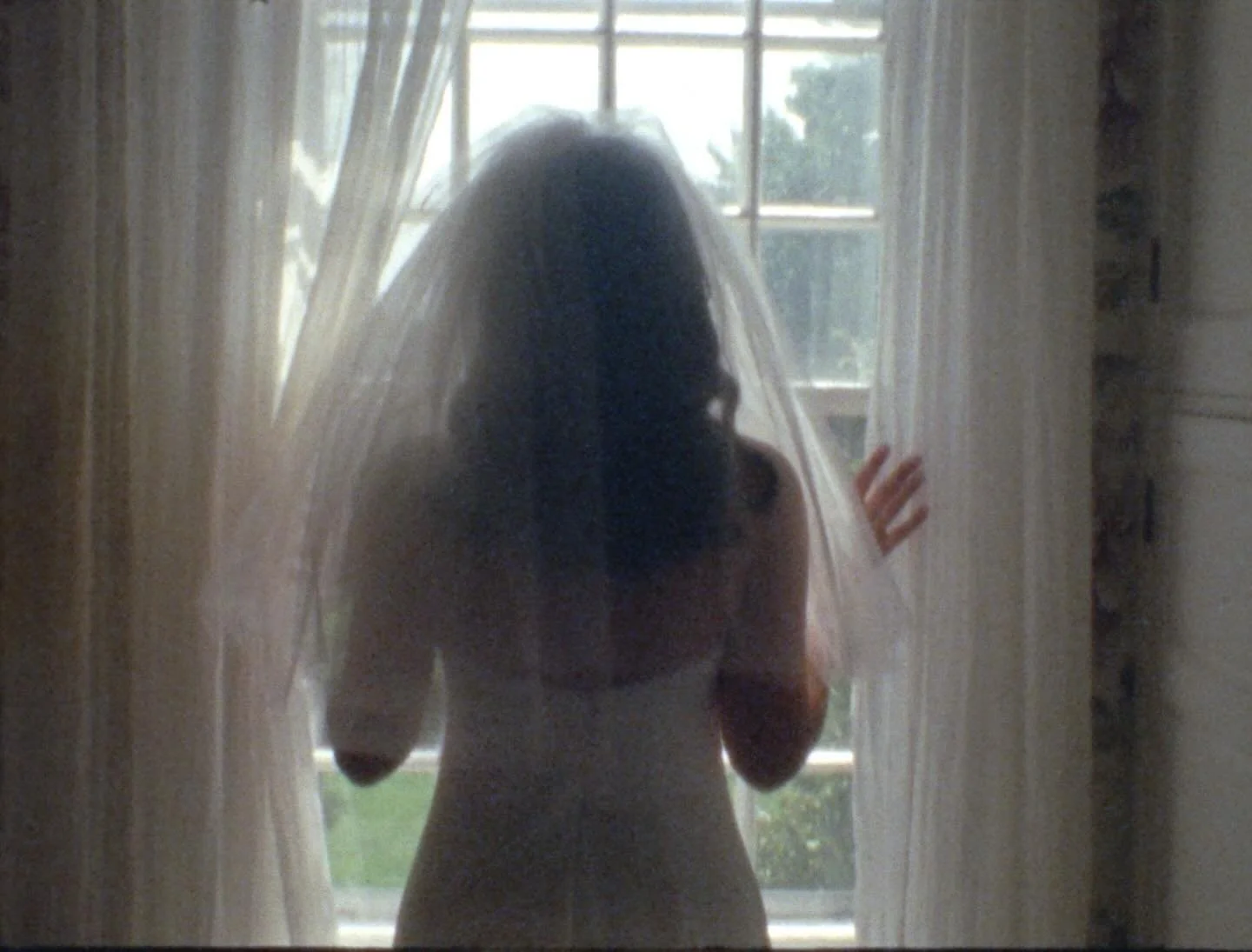 Some of my favorite frames from the last couple of years documenting love on Super 8. 🎞️