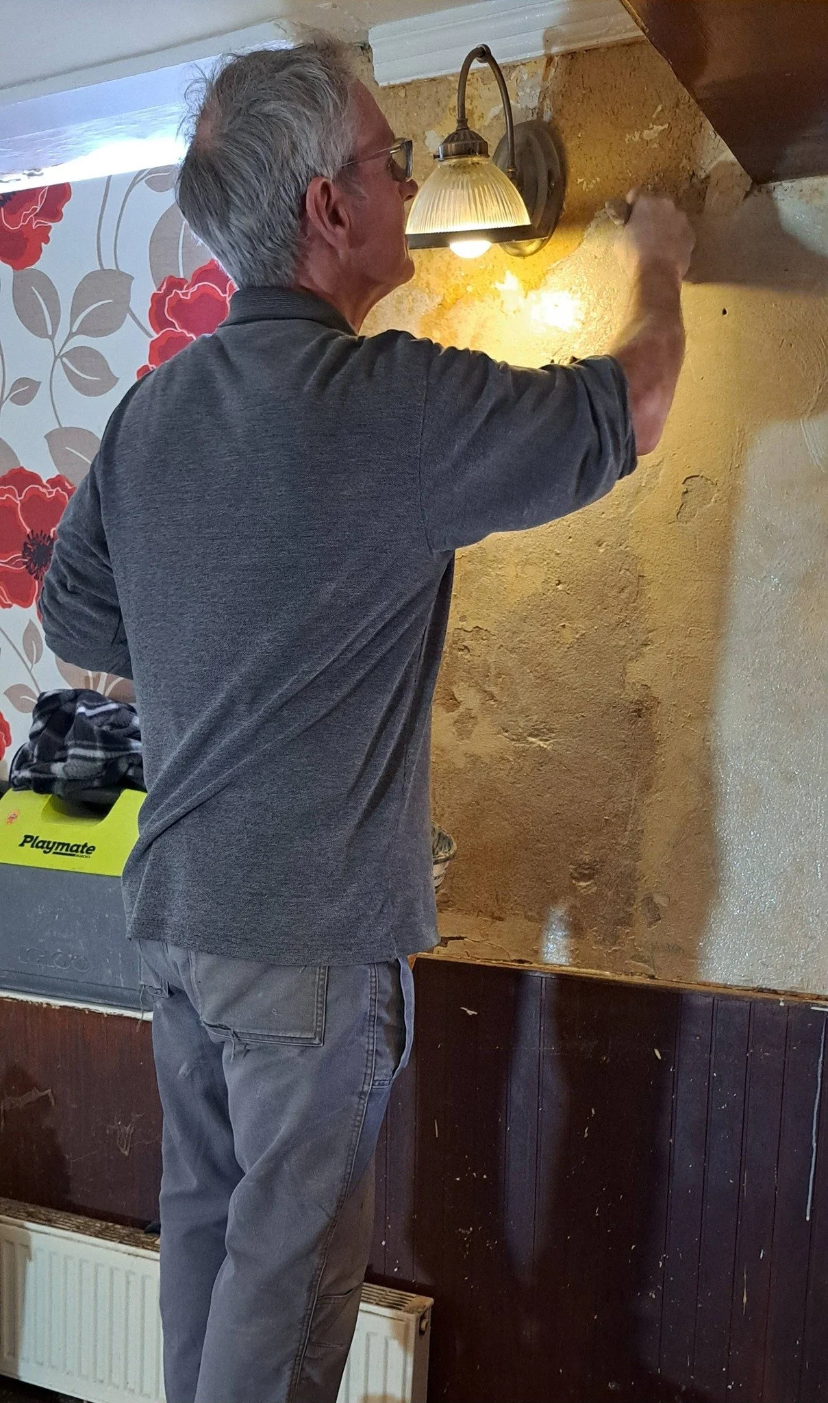 Repairing the walls ready for painting