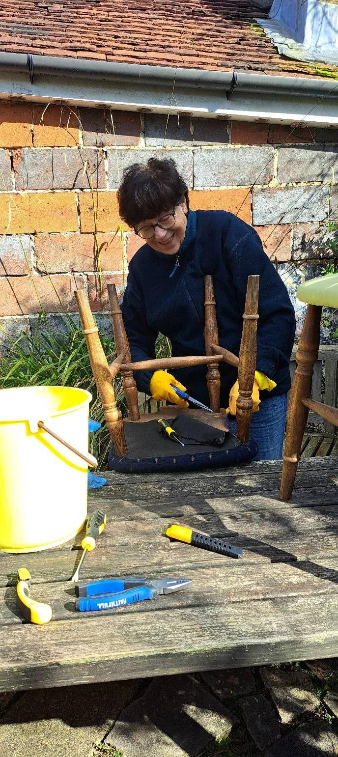 Stripping chairs ready for recovering