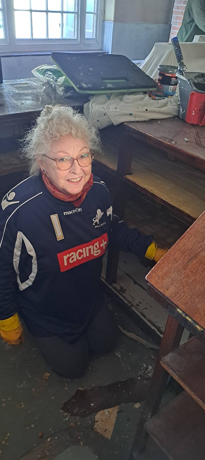Stripping glass shelves ready for cleaning