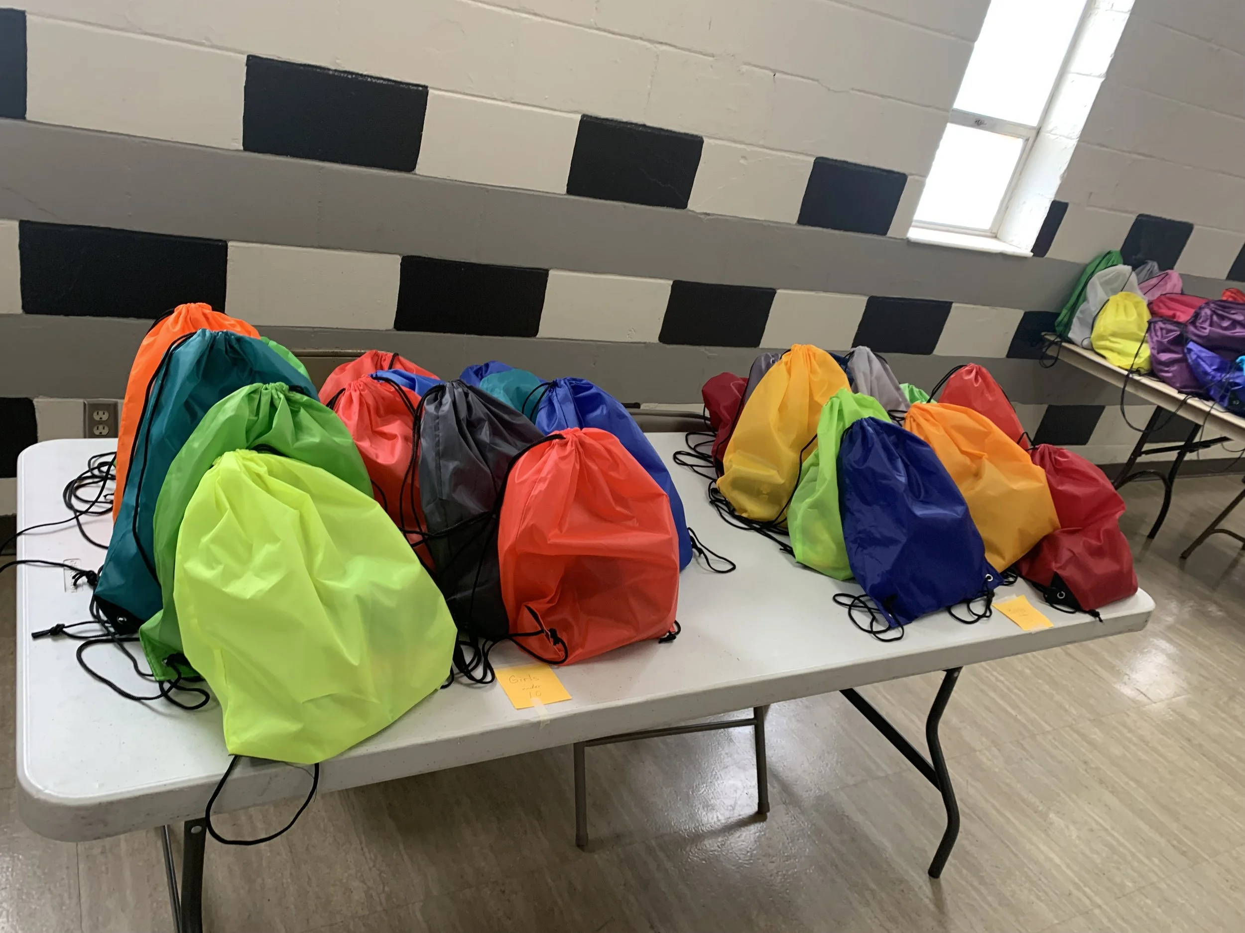 KOSQS serve 120 individuals with male and Female Hygiene Packs.