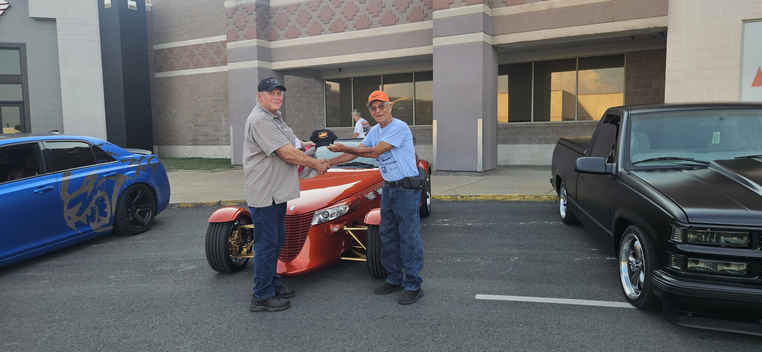 Tom presented Jerry a "Honorary Corvette" hat.