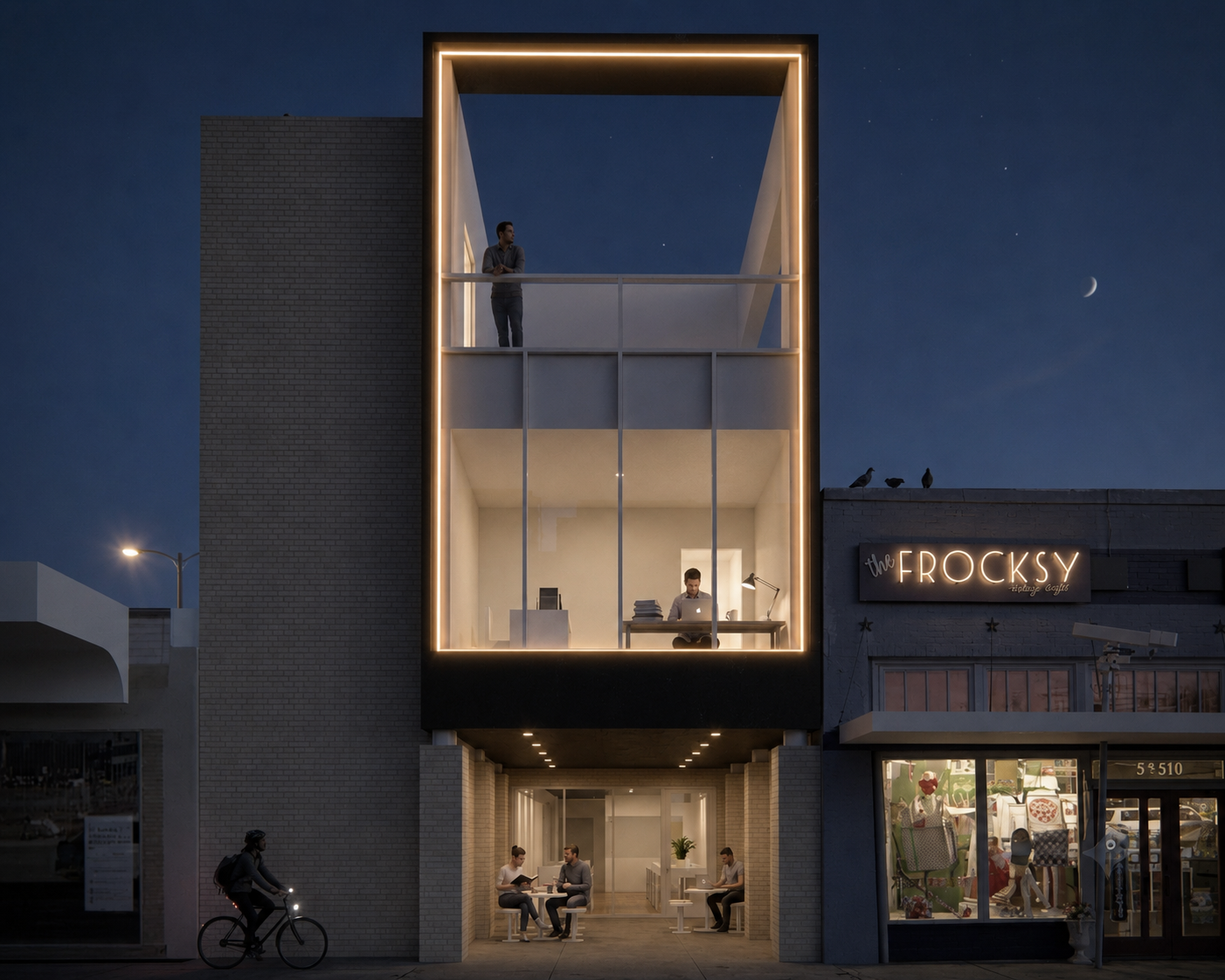 A modern multi-story building at night with large glass windows. Inside, a person is working on a laptop at a desk on the lower floor, and another person is observing from a balcony above. Pedestrians and a cyclist are visible outside, and the sky sh