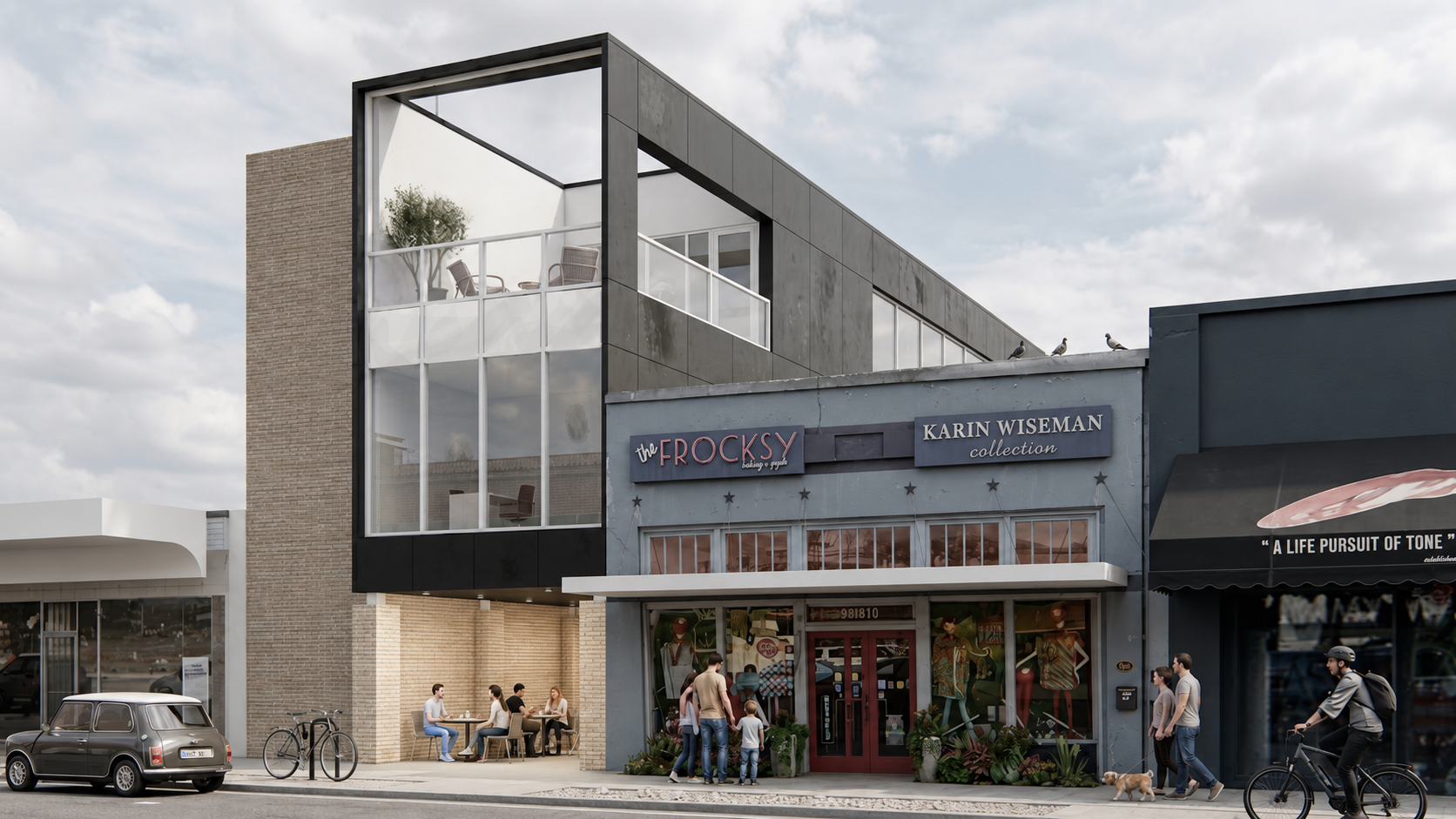 City street scene with a modern building featuring a glass balcony, storefronts, pedestrians, bicycles, and a vintage car, under a cloudy sky.