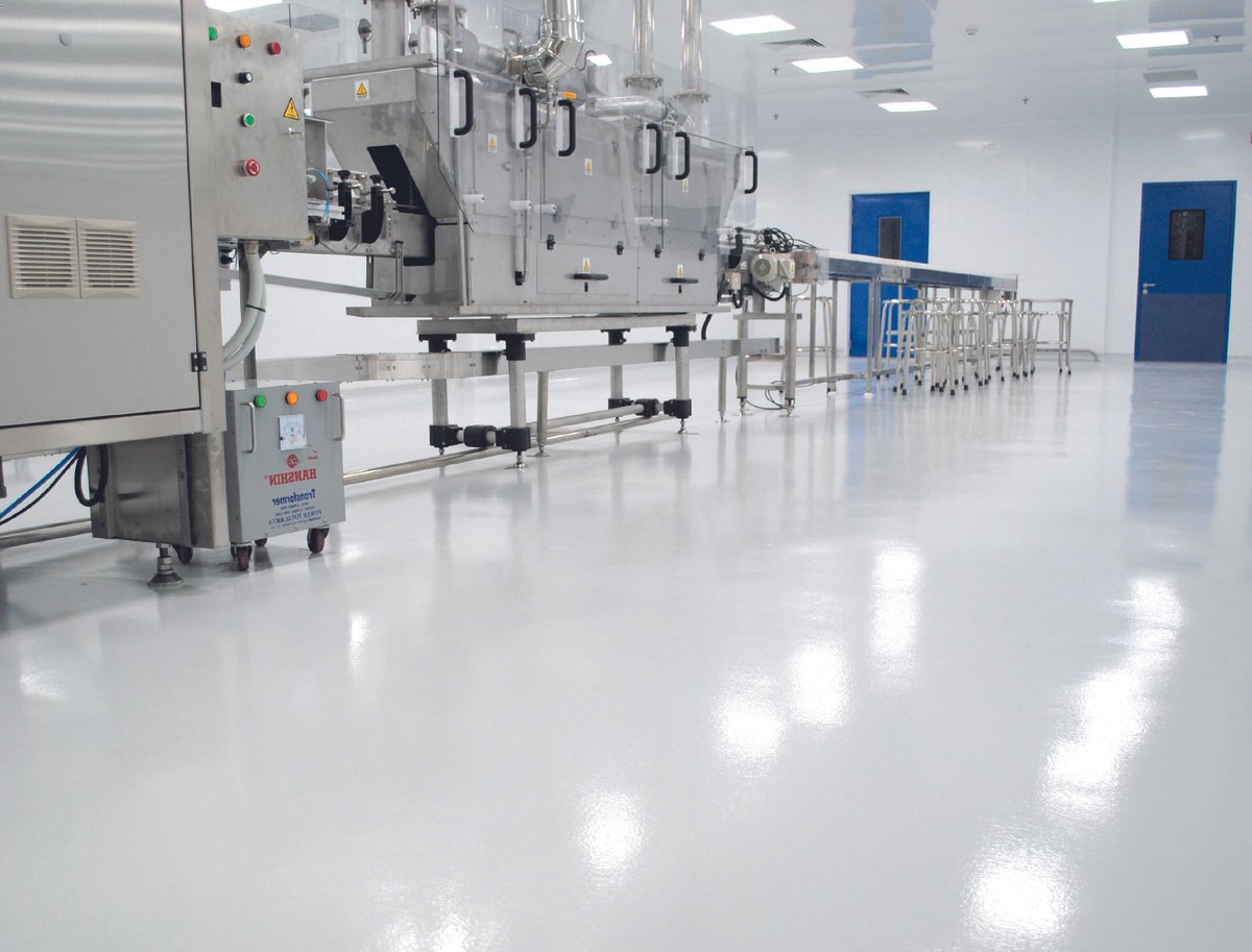 Seamless clean room flooring in a controlled environment