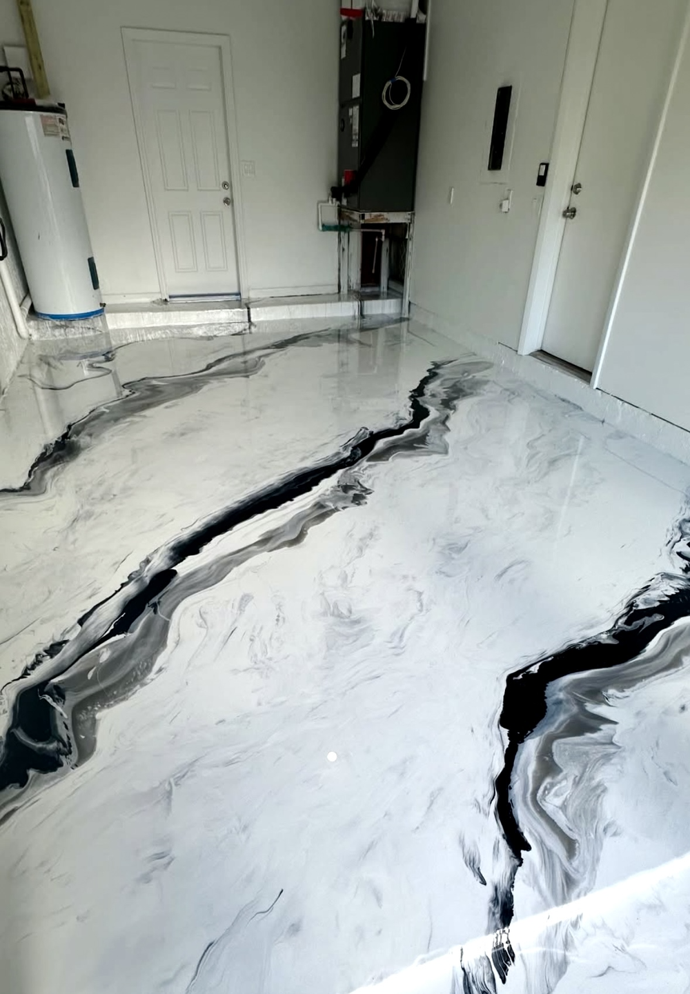 Showroom seamless metallic epoxy pour
