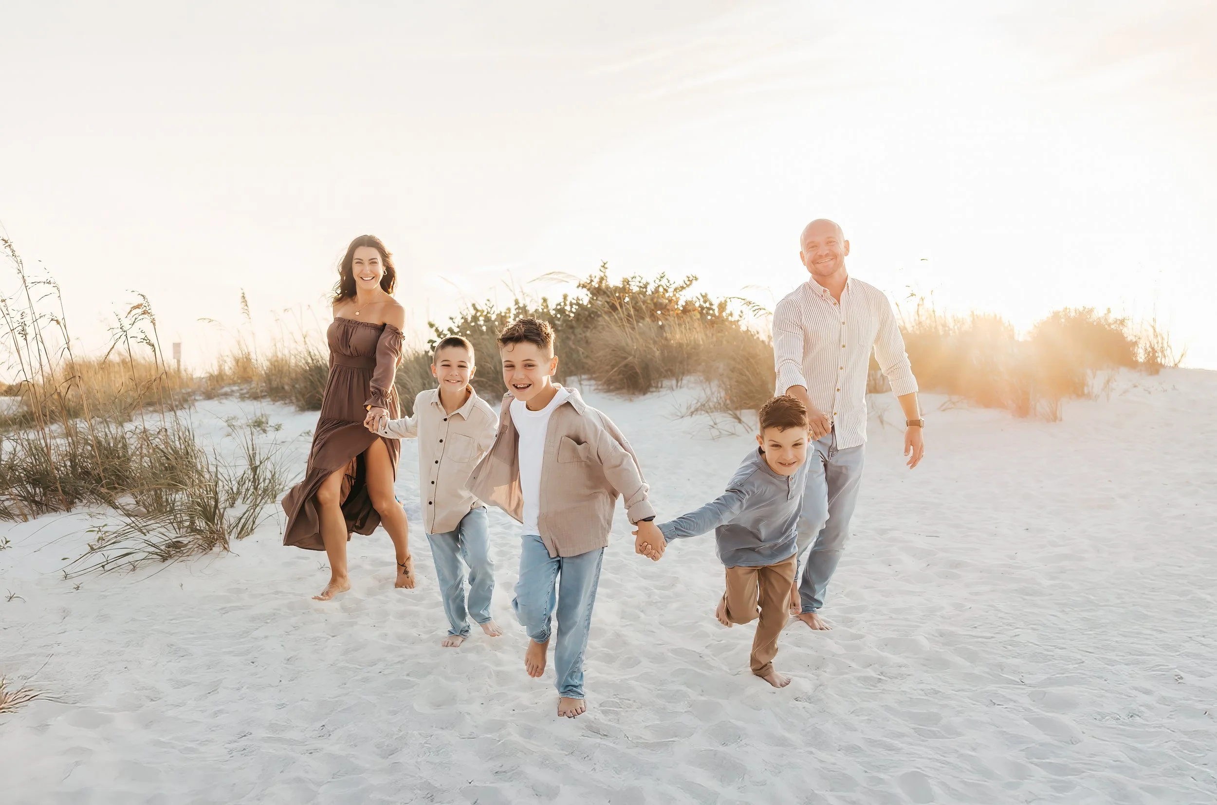 happy family on a beach; south peak pools fl